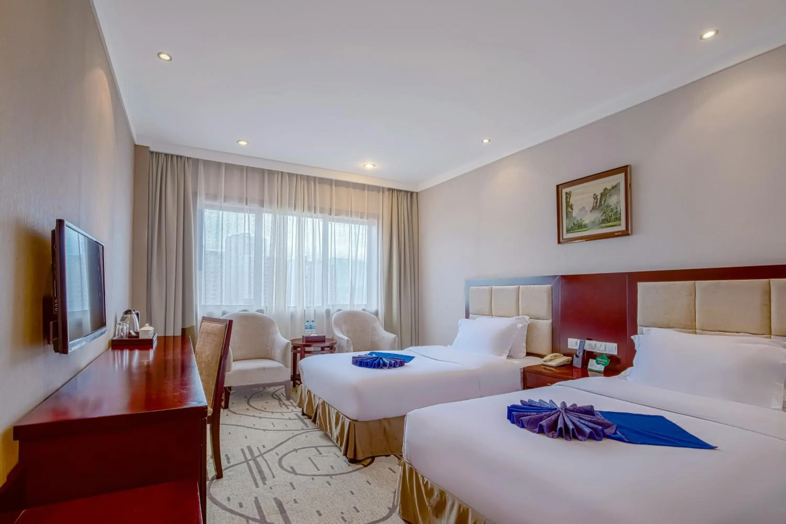 Bed in Zhangjiajie International Hotel Bed in Zhangjiajie International Hotel