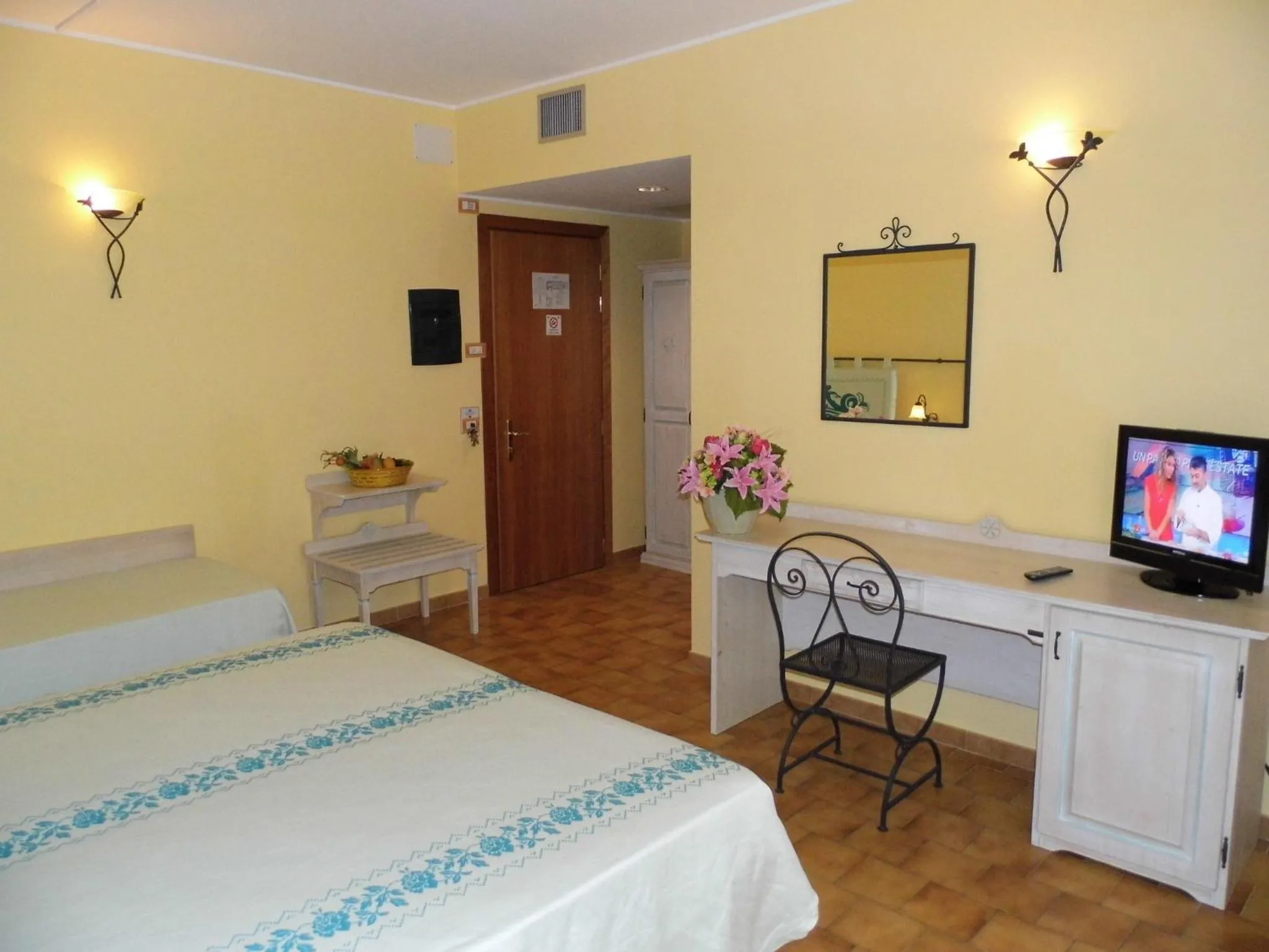 Bed in Le Nereidi Hotel & Residence