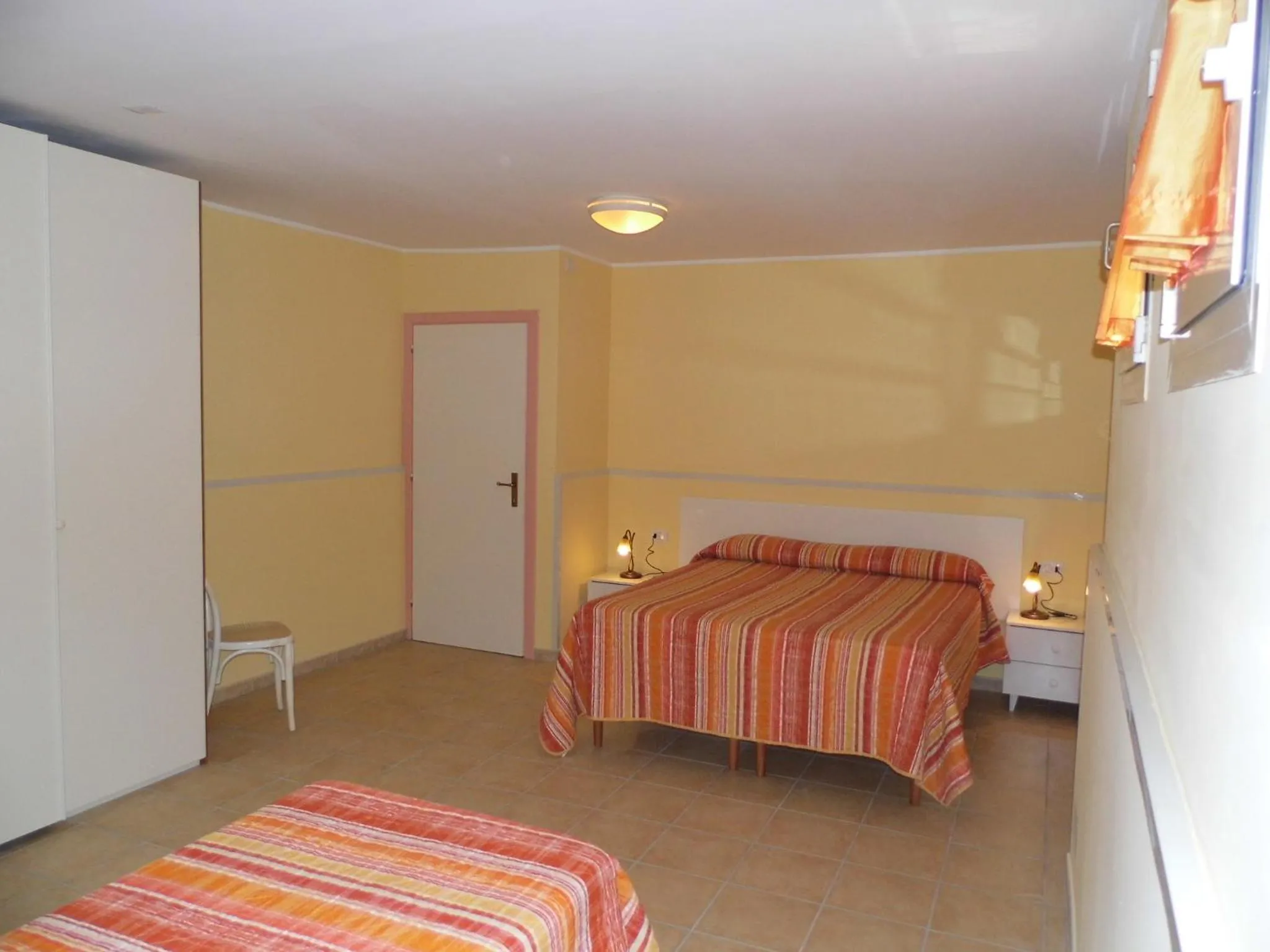 Photo of the whole room, Bed in Le Nereidi Hotel & Residence