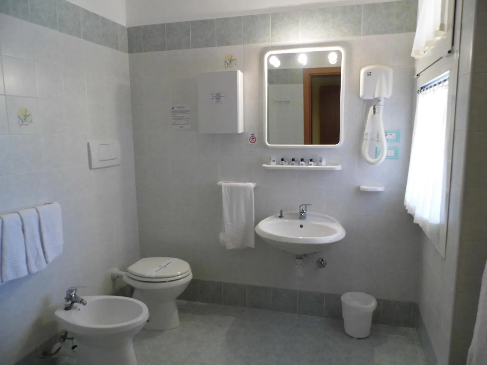 Family Room (2 Adults + 1 Child) in LE NEREIDI Hotel & Residence Family Room (2 Adults + 1 Child) in LE NEREIDI Hotel & Residence