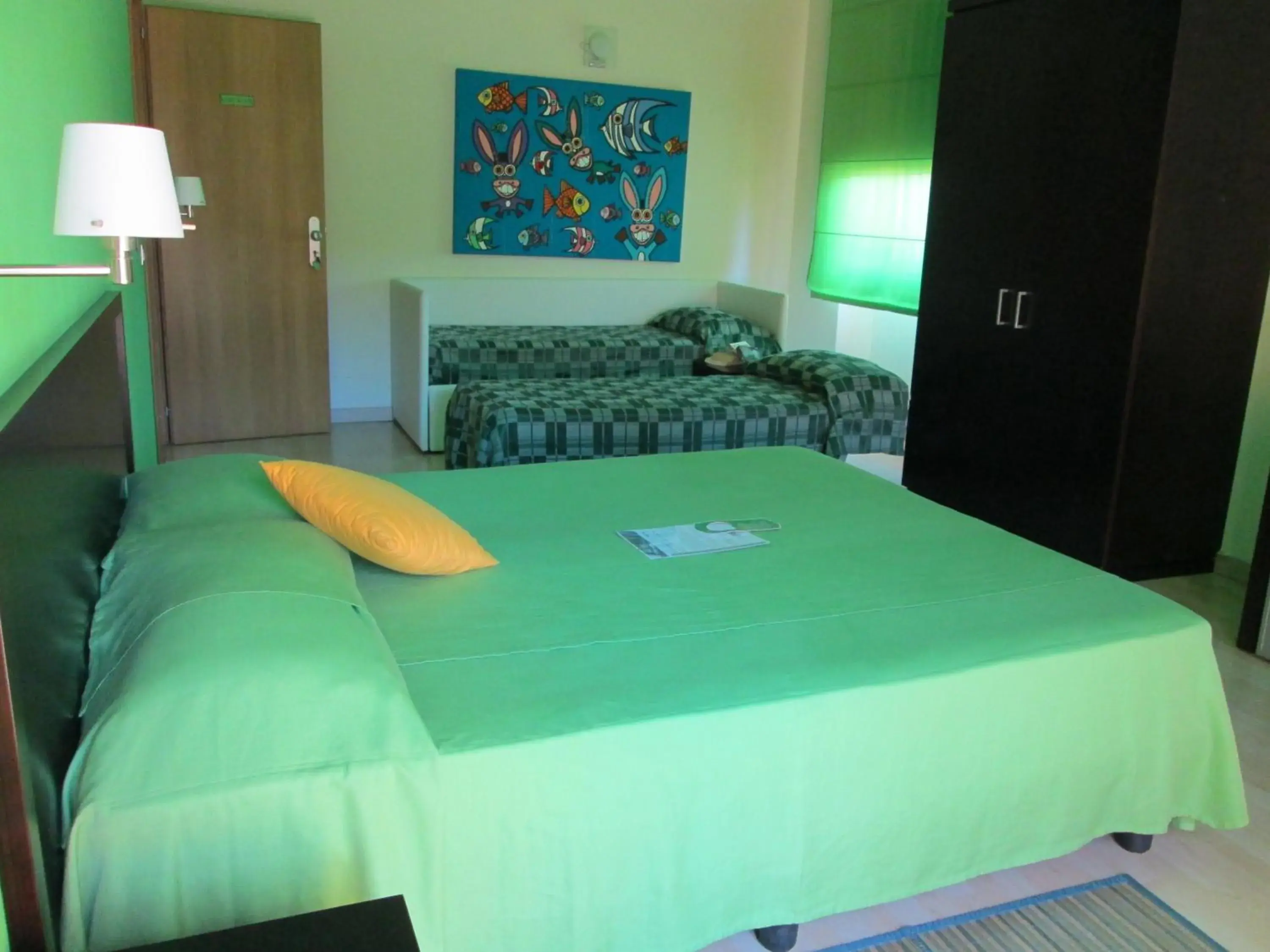 Quadruple Room with Balcony in Hotel I Colori Quadruple Room with Balcony in Hotel I Colori