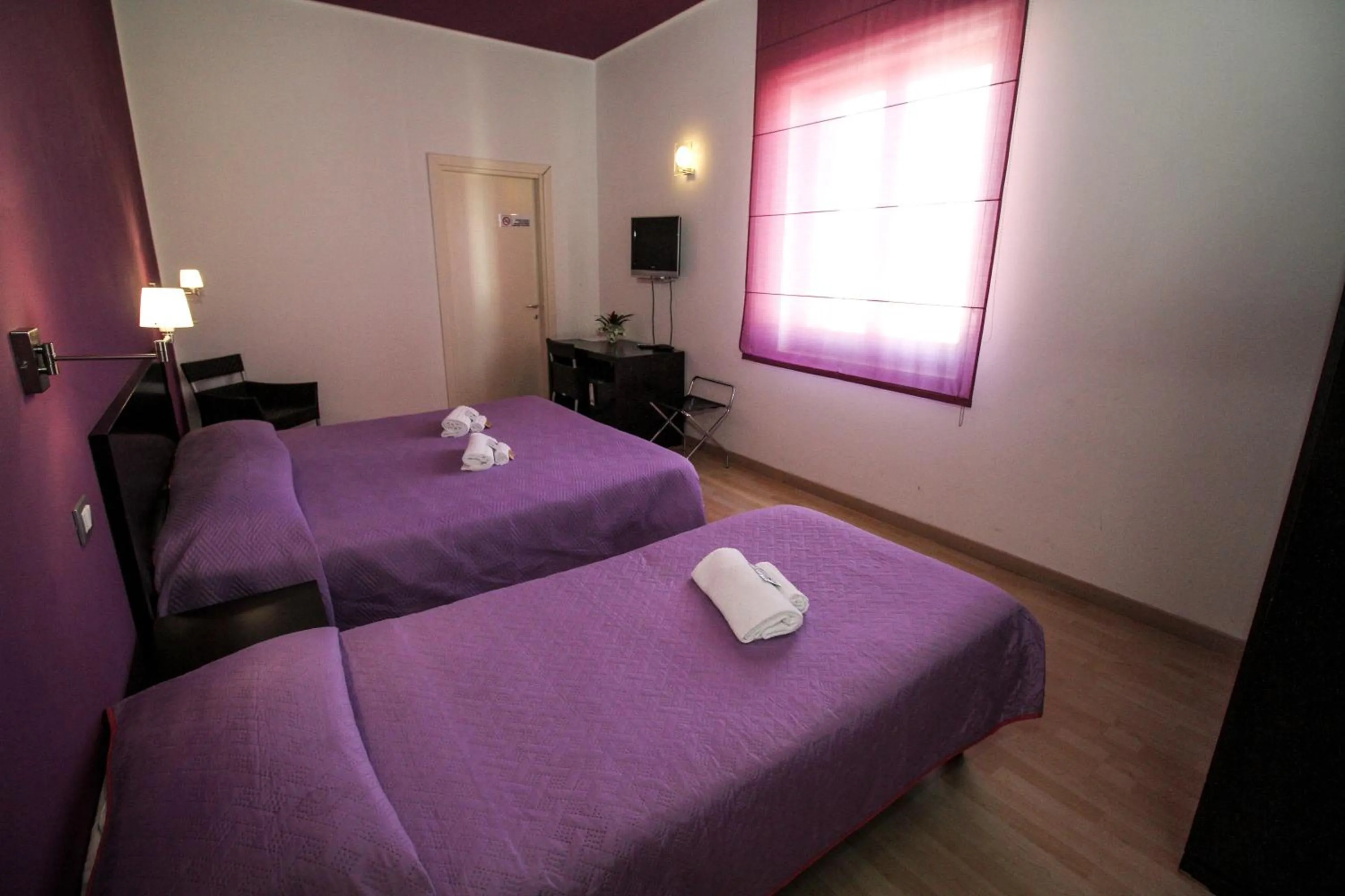 Bed in Hotel I Colori