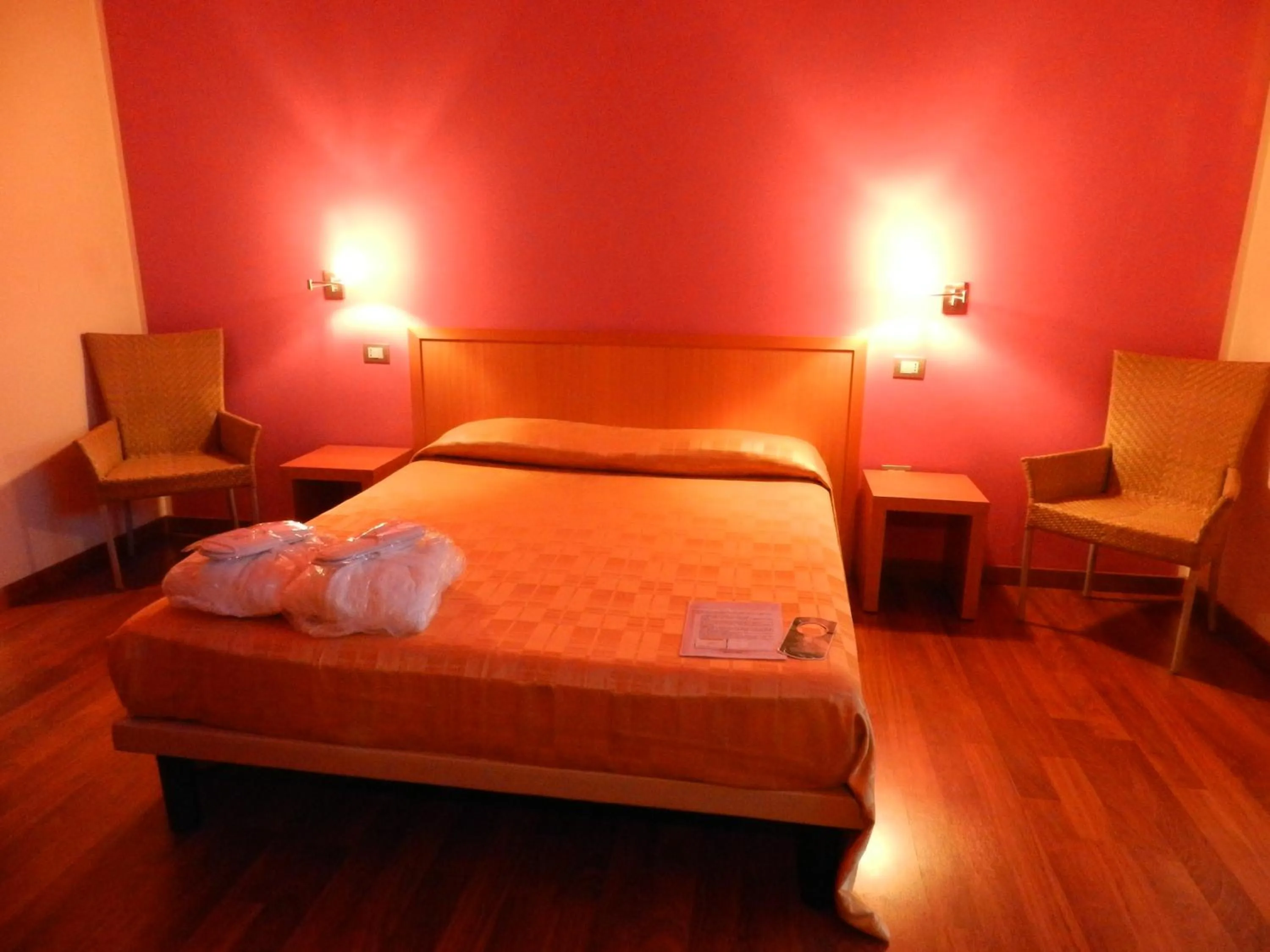 Photo of the whole room, Bed in Hotel I Colori