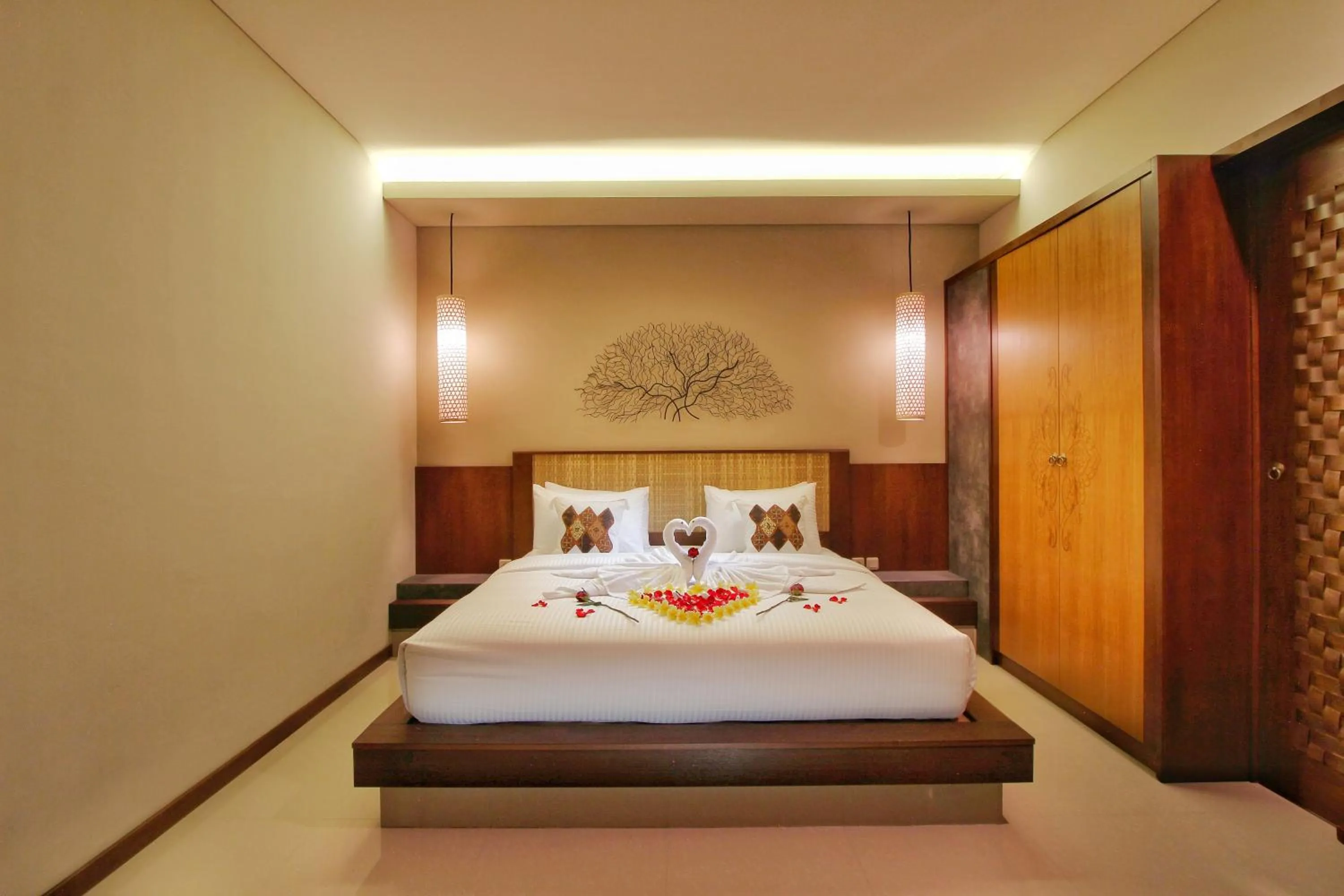 Bedroom, Bed in Maharaja Villas Bali - CHSE Certified