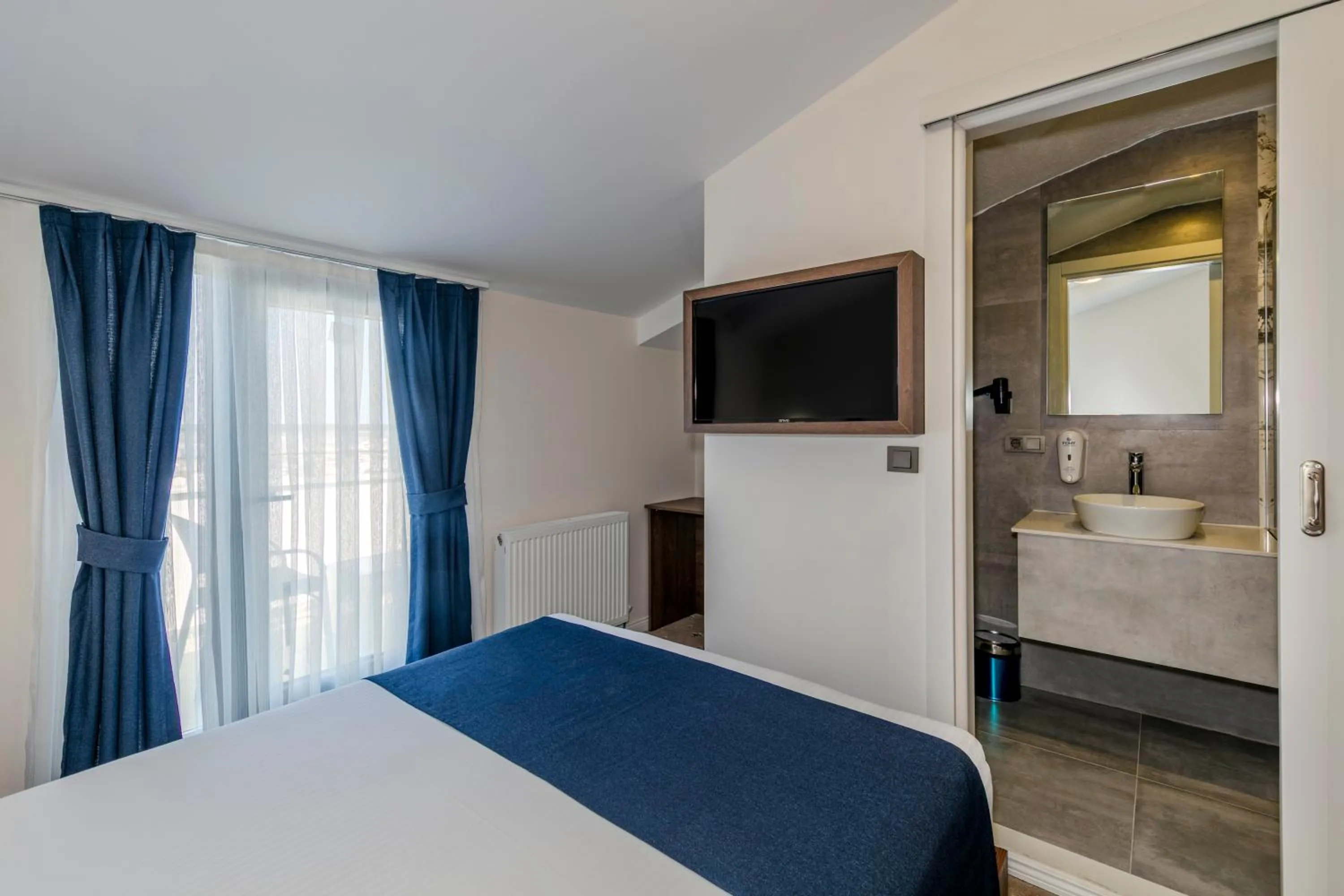 Photo of the whole room, Bed in Airport Waves Hotel