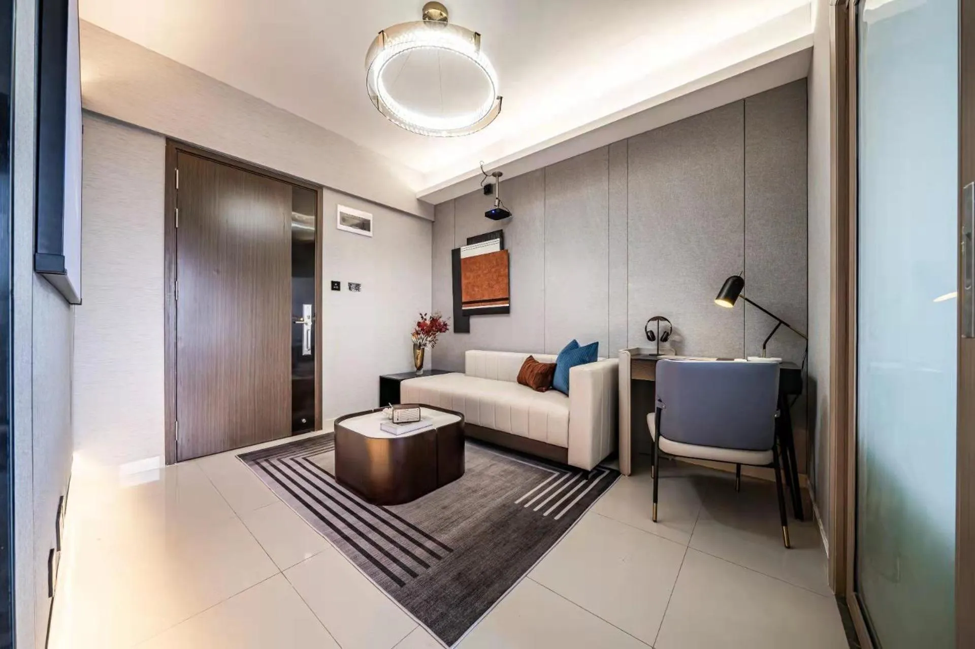 Living room, Bed in Kingkey Shuibei International Apartment Hotel