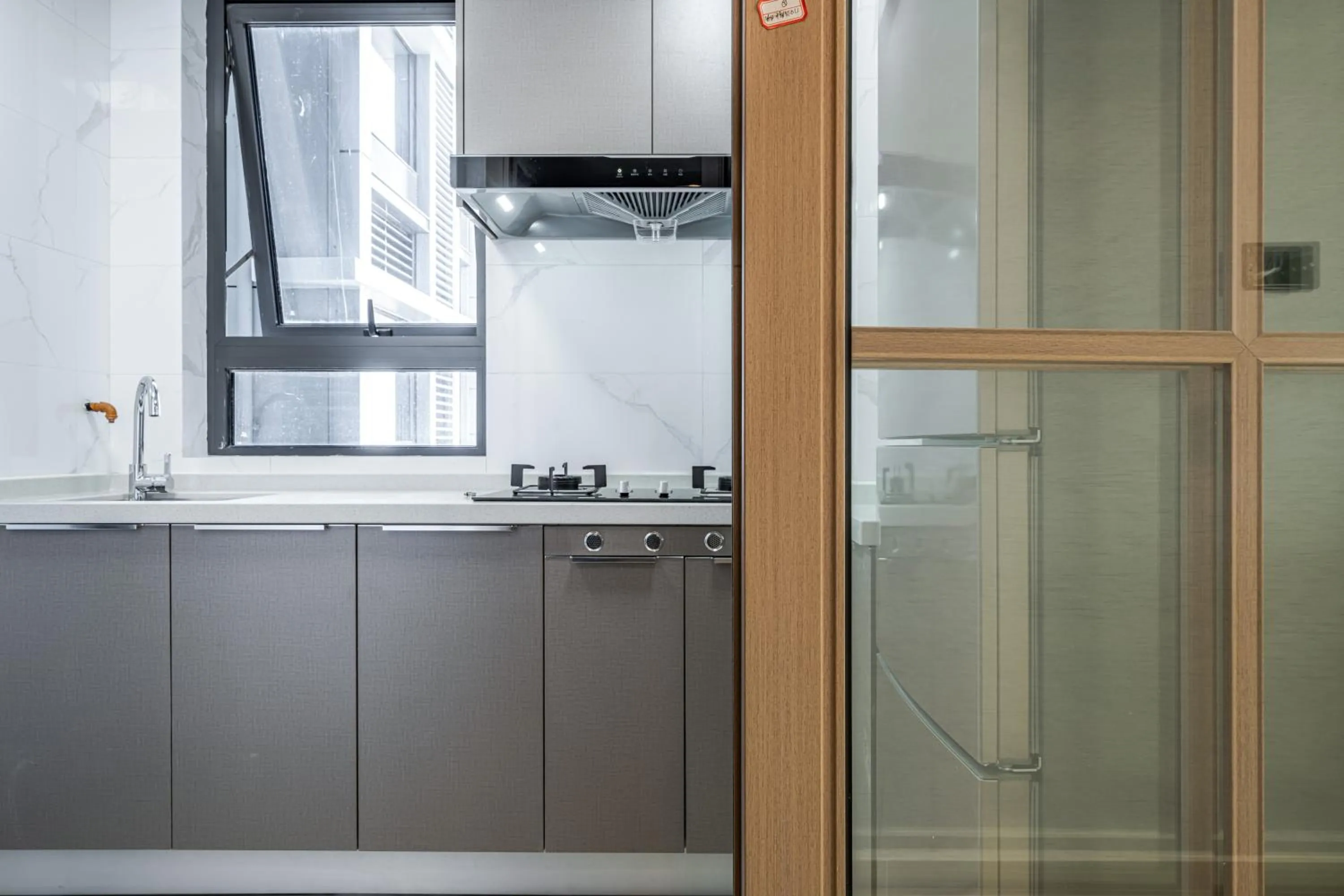 kitchen in Kingkey Shuibei International Apartment Hotel