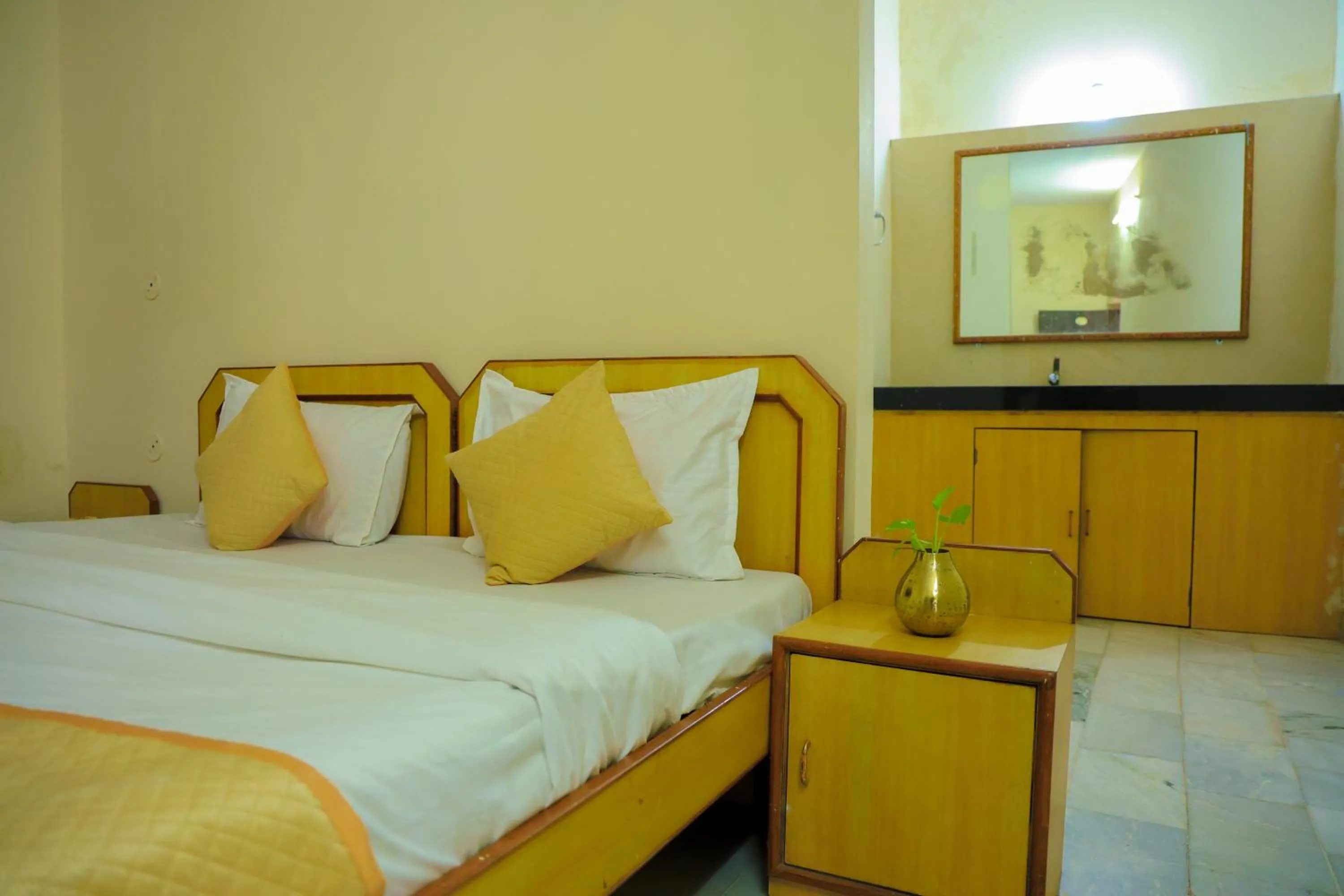 Bed in The Lala Hotel and Resort