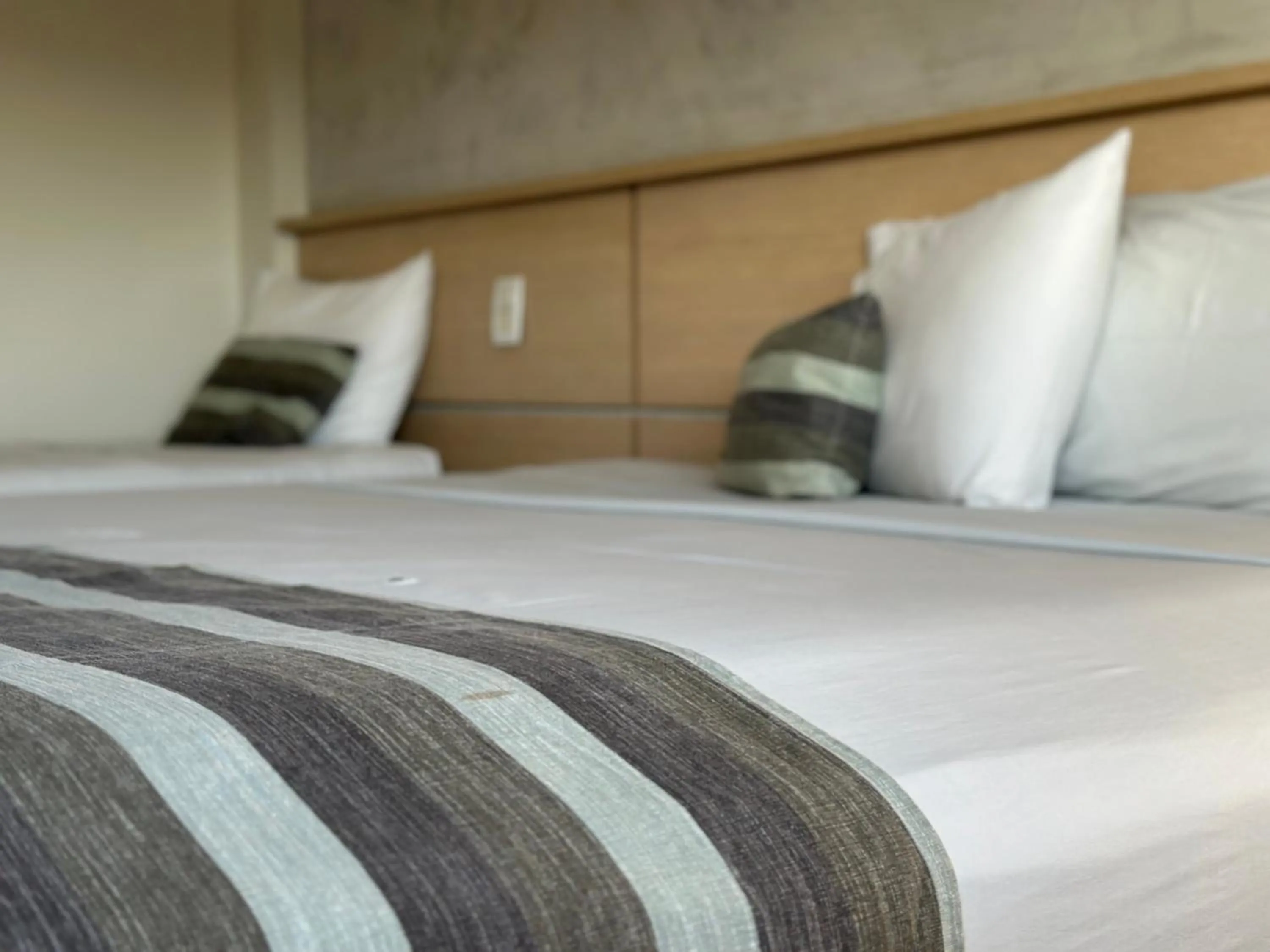 Bed in Atrium Confort Hotels