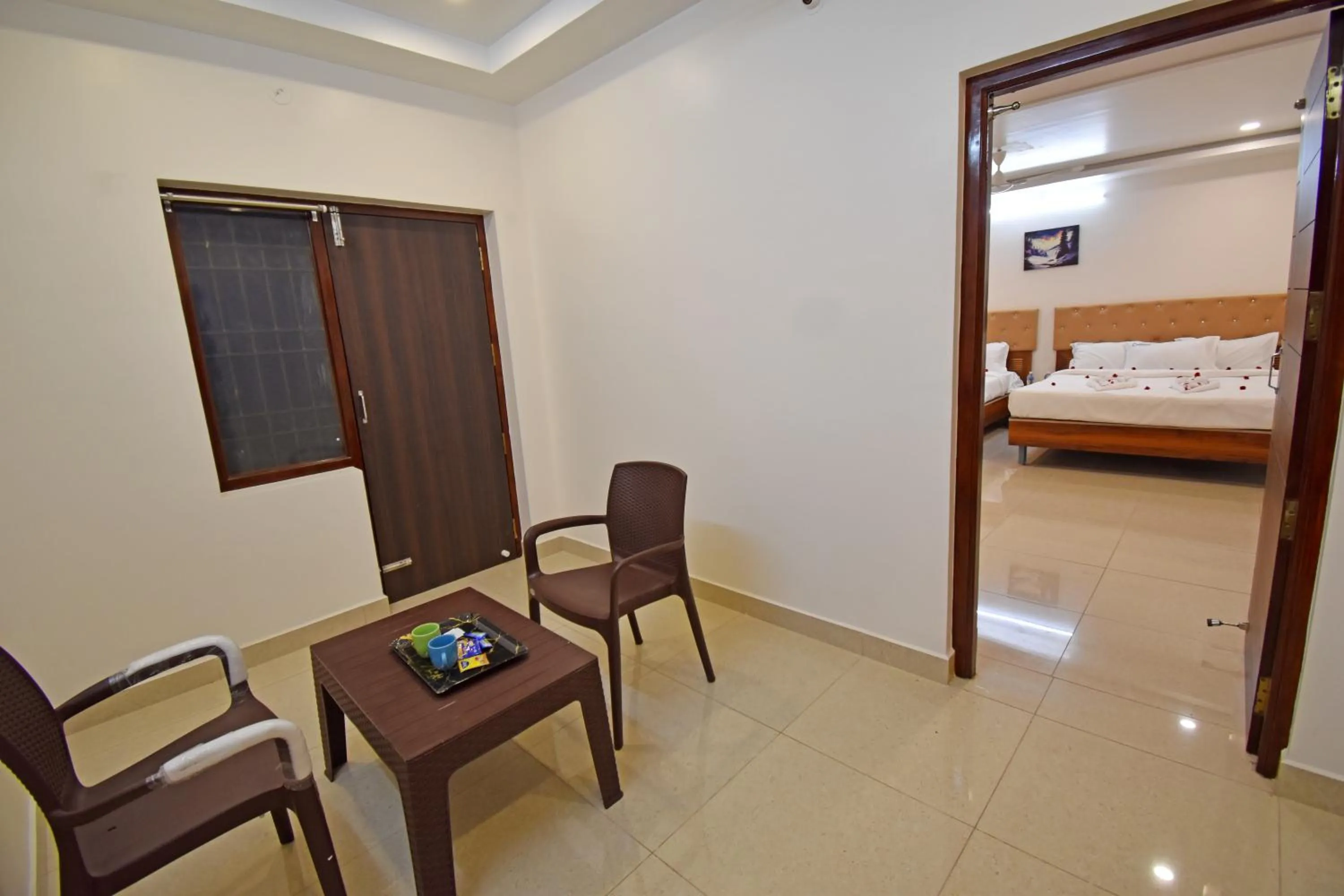 Living room, Bed in Cannan Residency Pondicherry