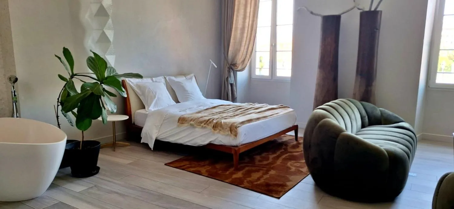 Bed in Les Suites Massena