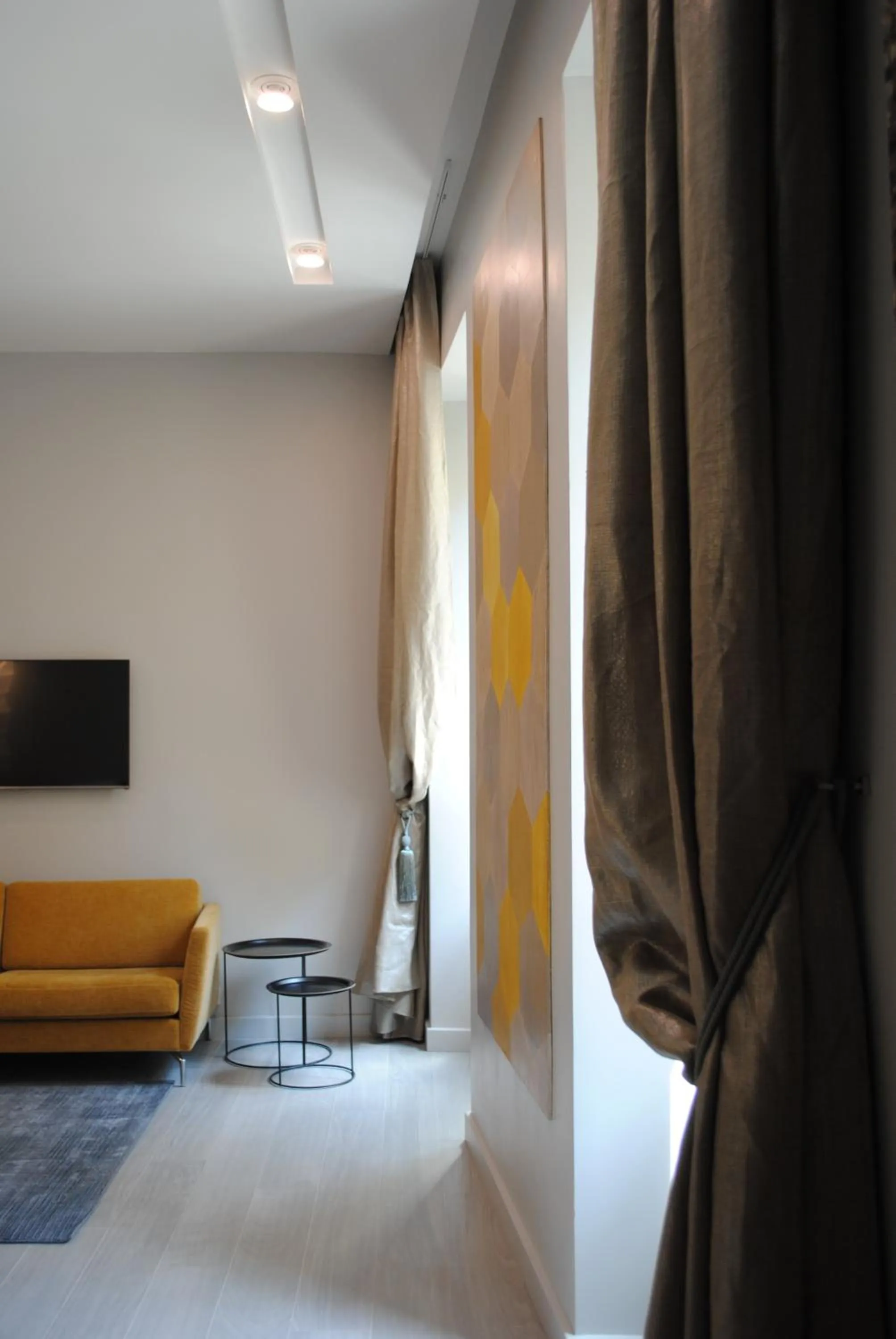 Seating area, Bed in Les Suites Massena