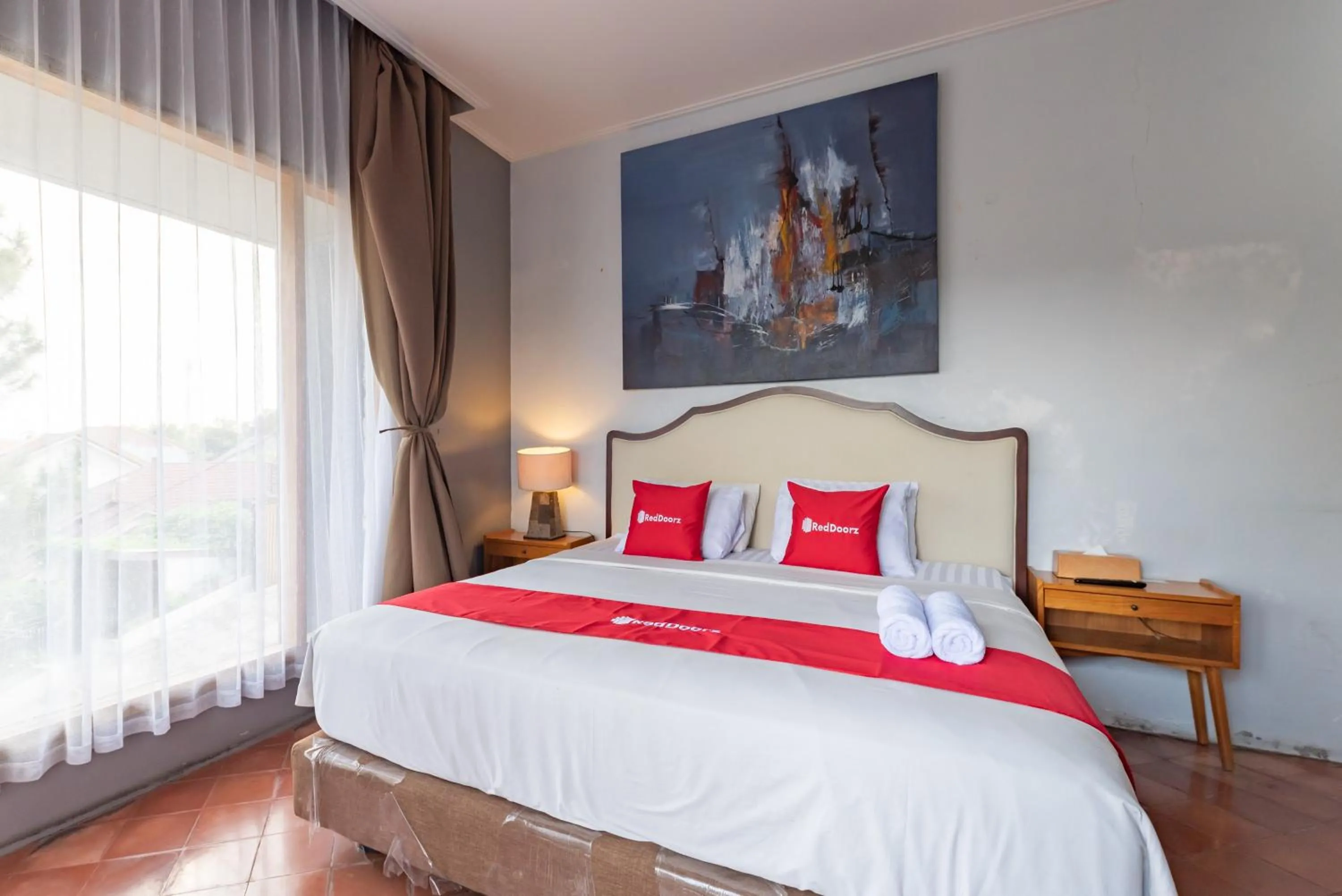 Deluxe Double Room in Casa de Apple Dago Bandung by RedDoorz