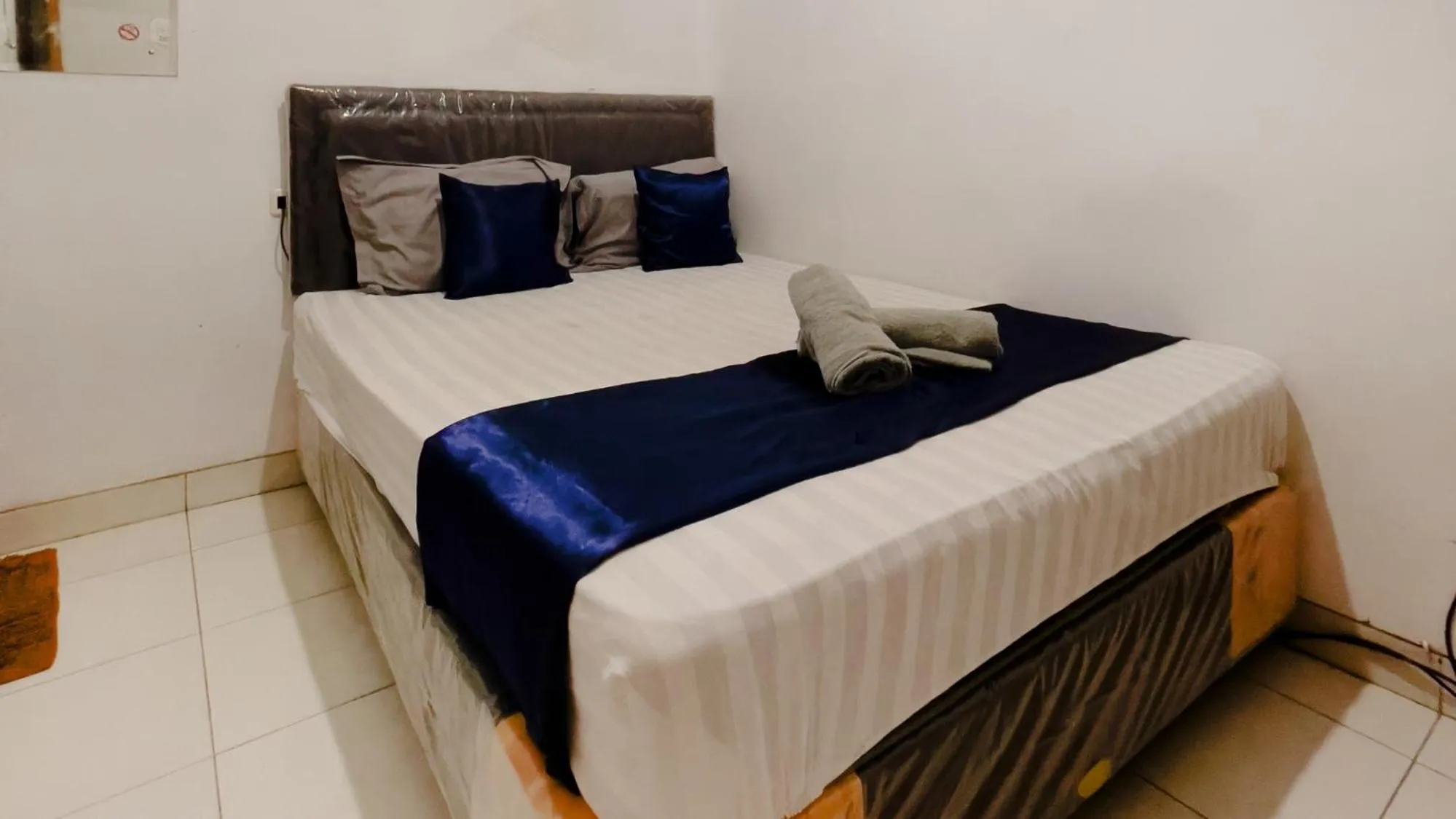 Bed in NamRoom at Tomang