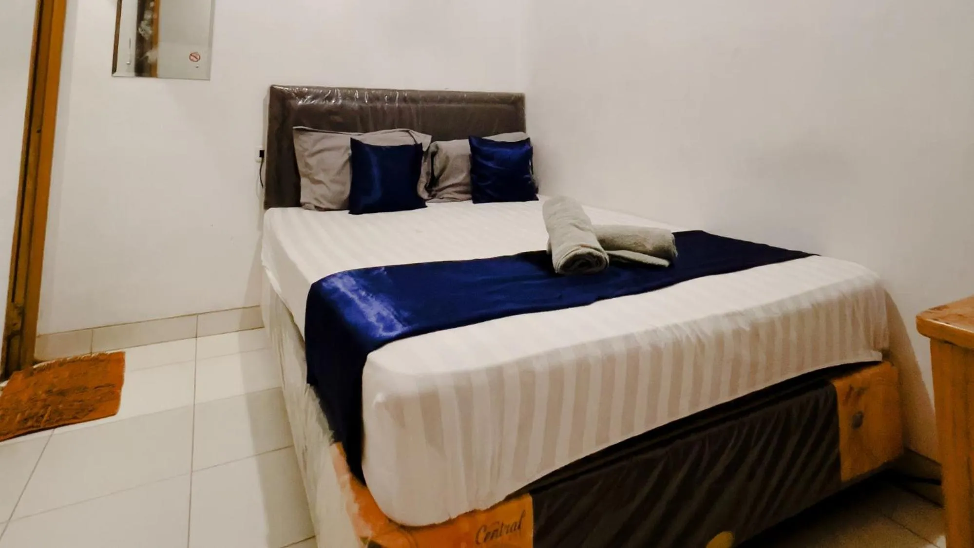 Bed in NamRoom at Tomang