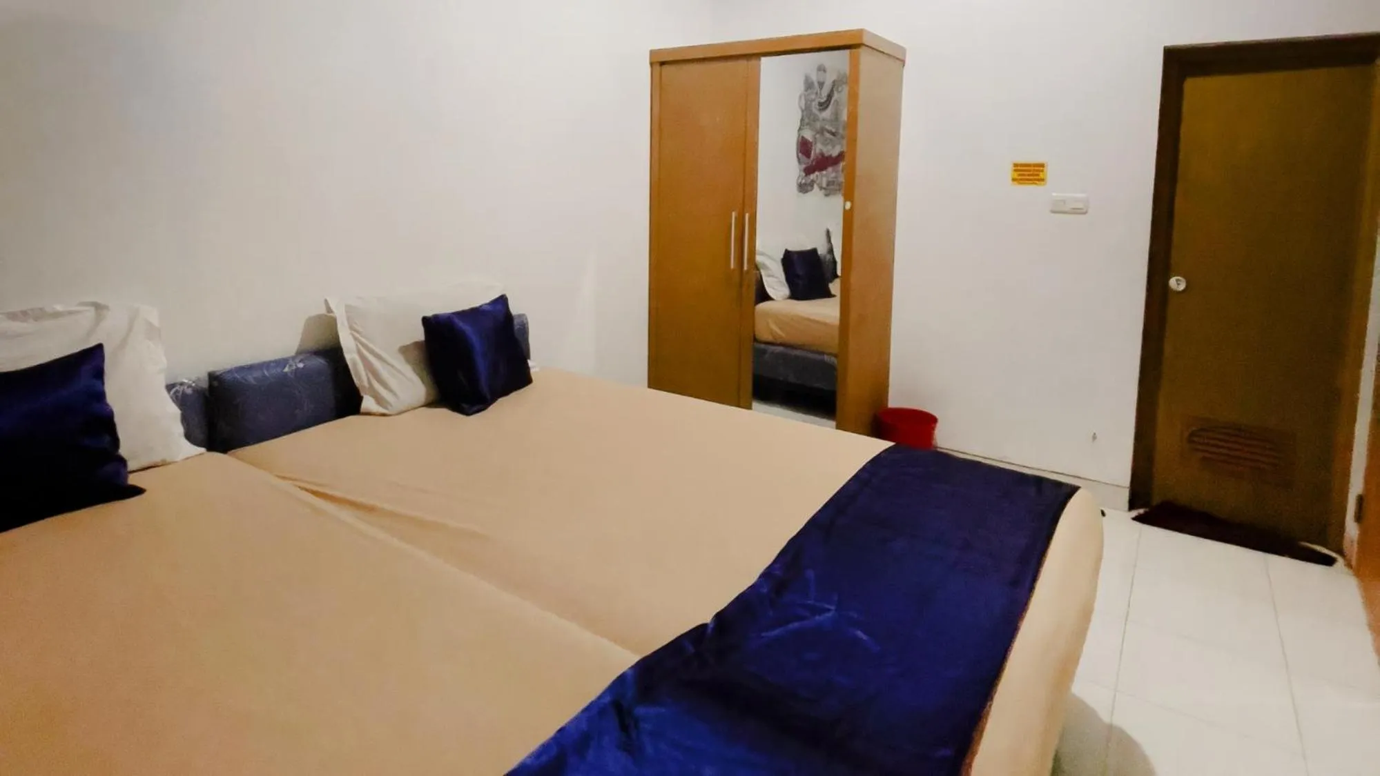 Bed in NamRoom at Tomang