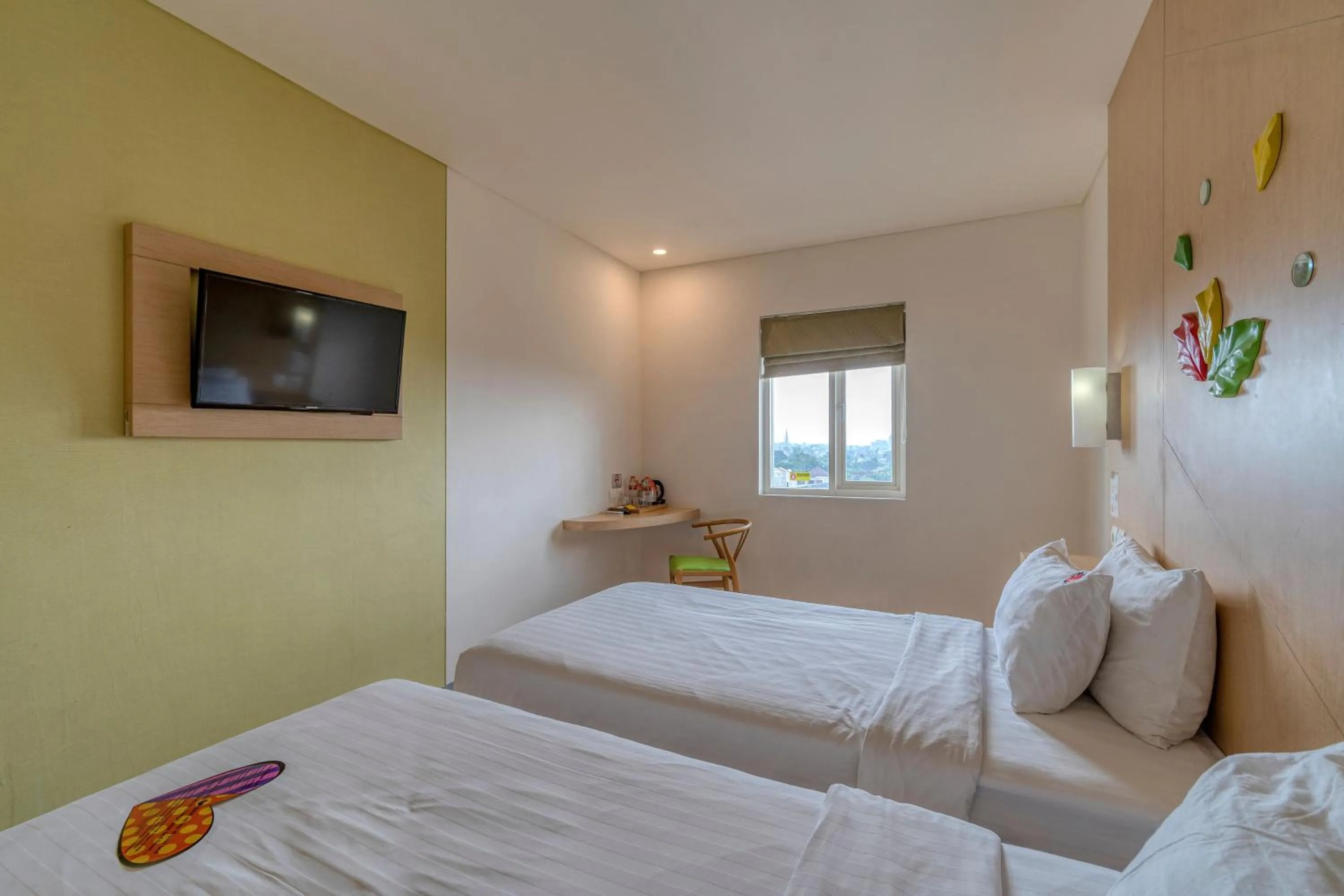 Bed in Ascent Hotel & Cafe Malang