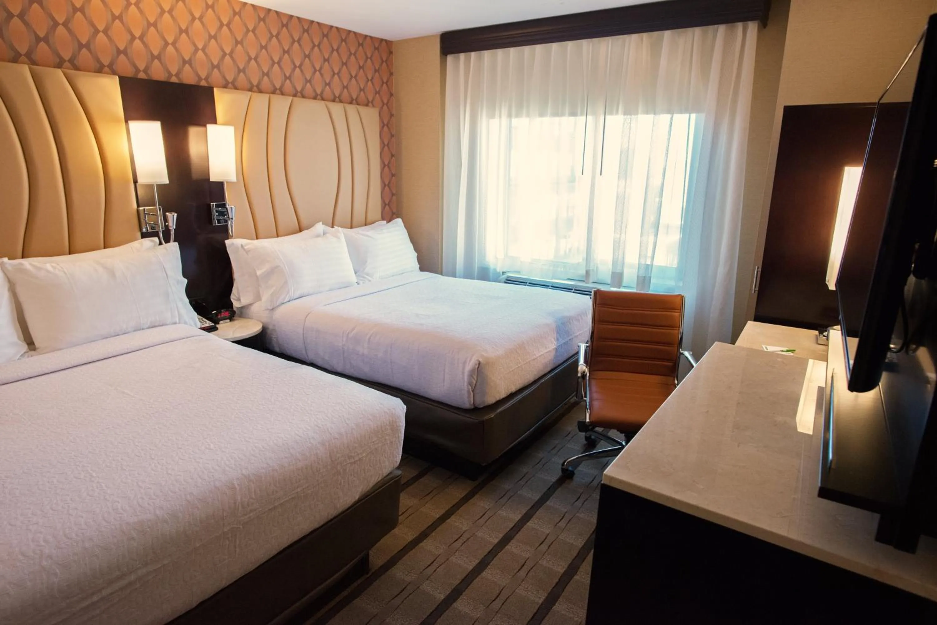 Photo of the whole room, Bed in Holiday Inn New York City - Times Square by IHG