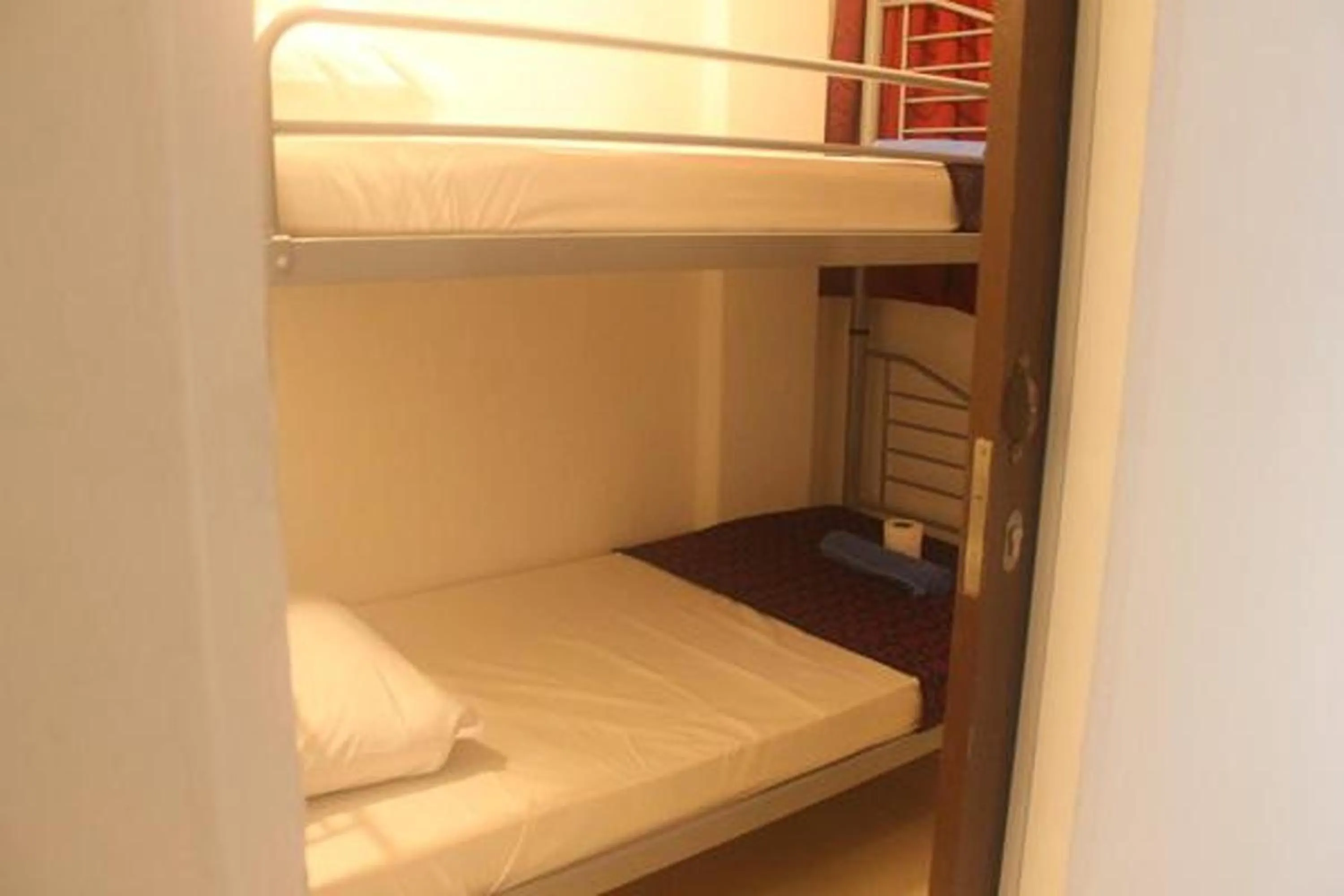 Bed in Ros Heritage Motel