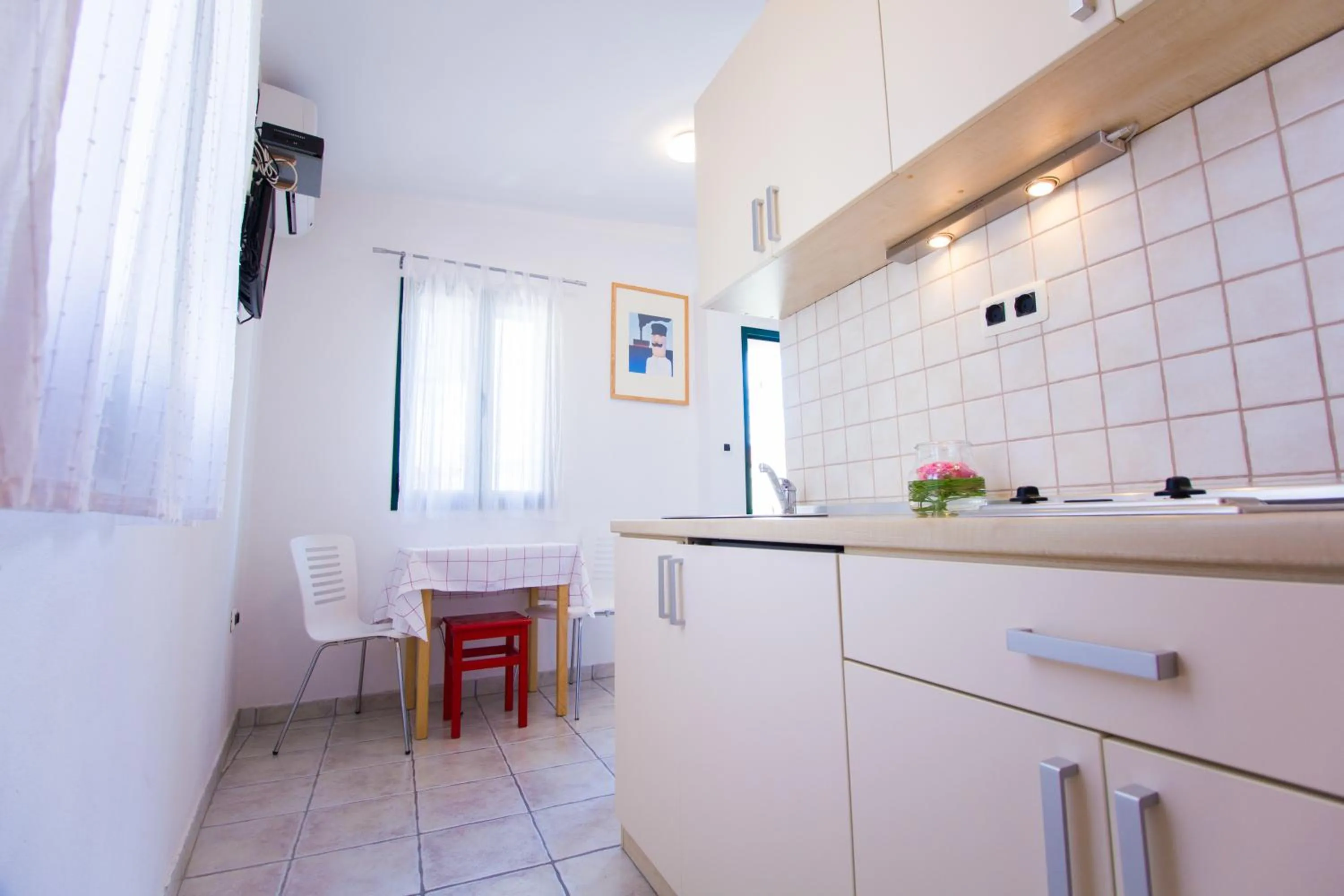 Kitchen or kitchenette in Apartments Baška