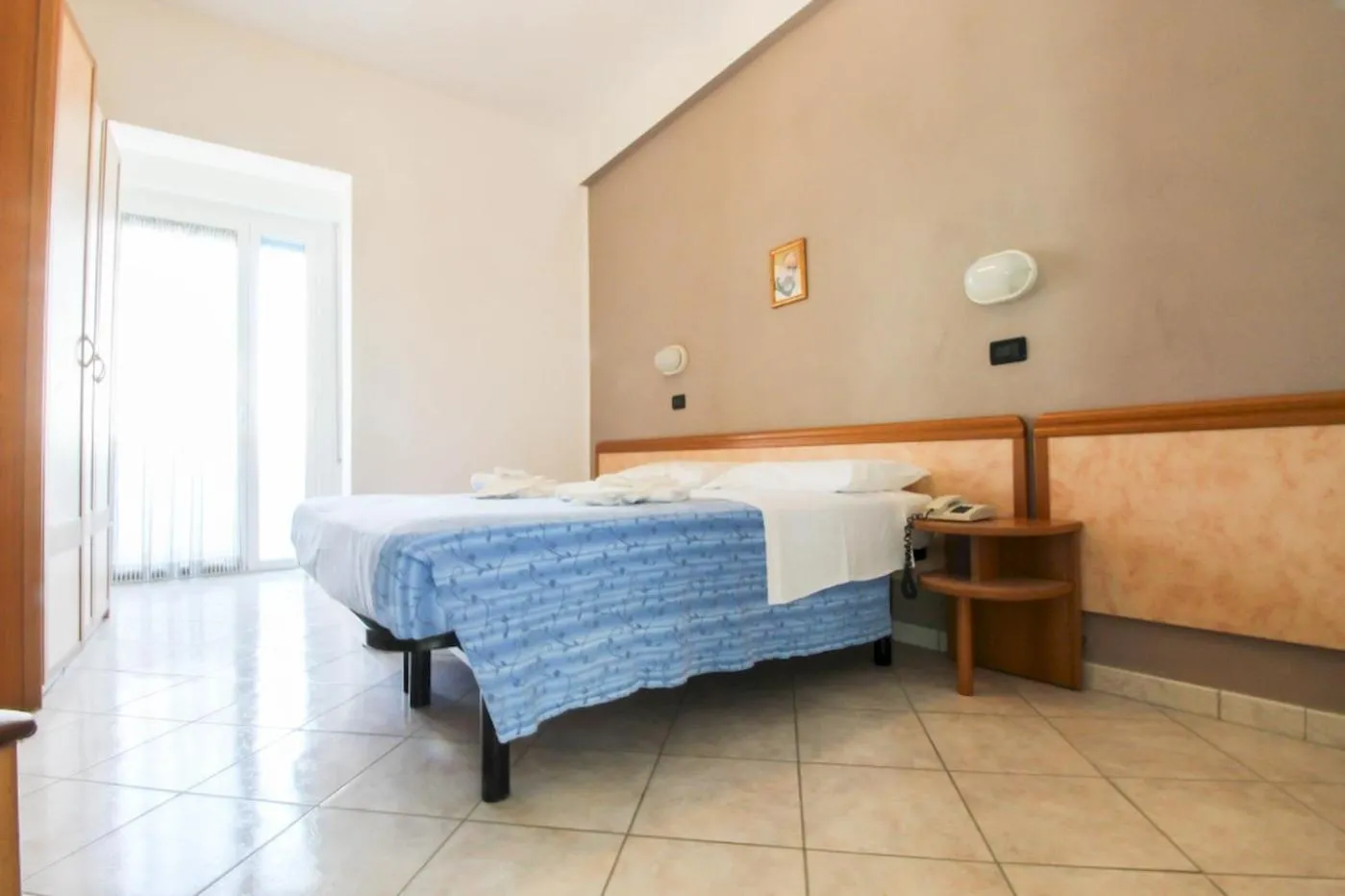 Bed in Hotel Abbondanza