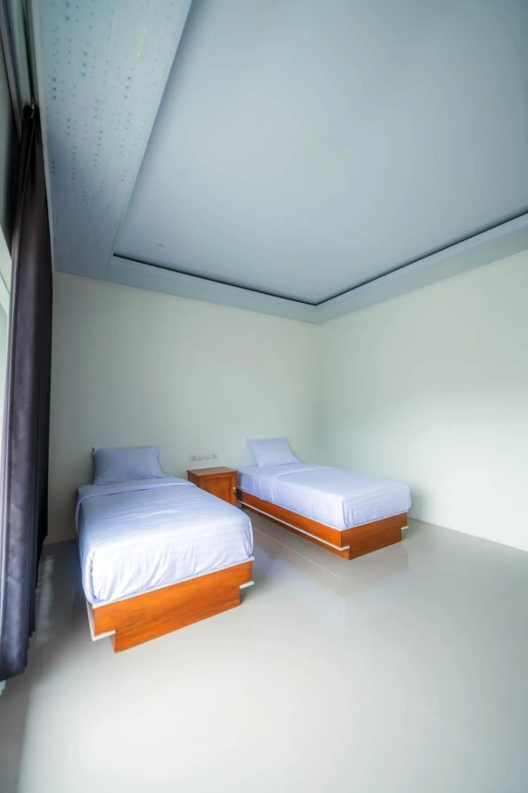 Bed in Grand Wijaya Hotel dan Villa Sarangan