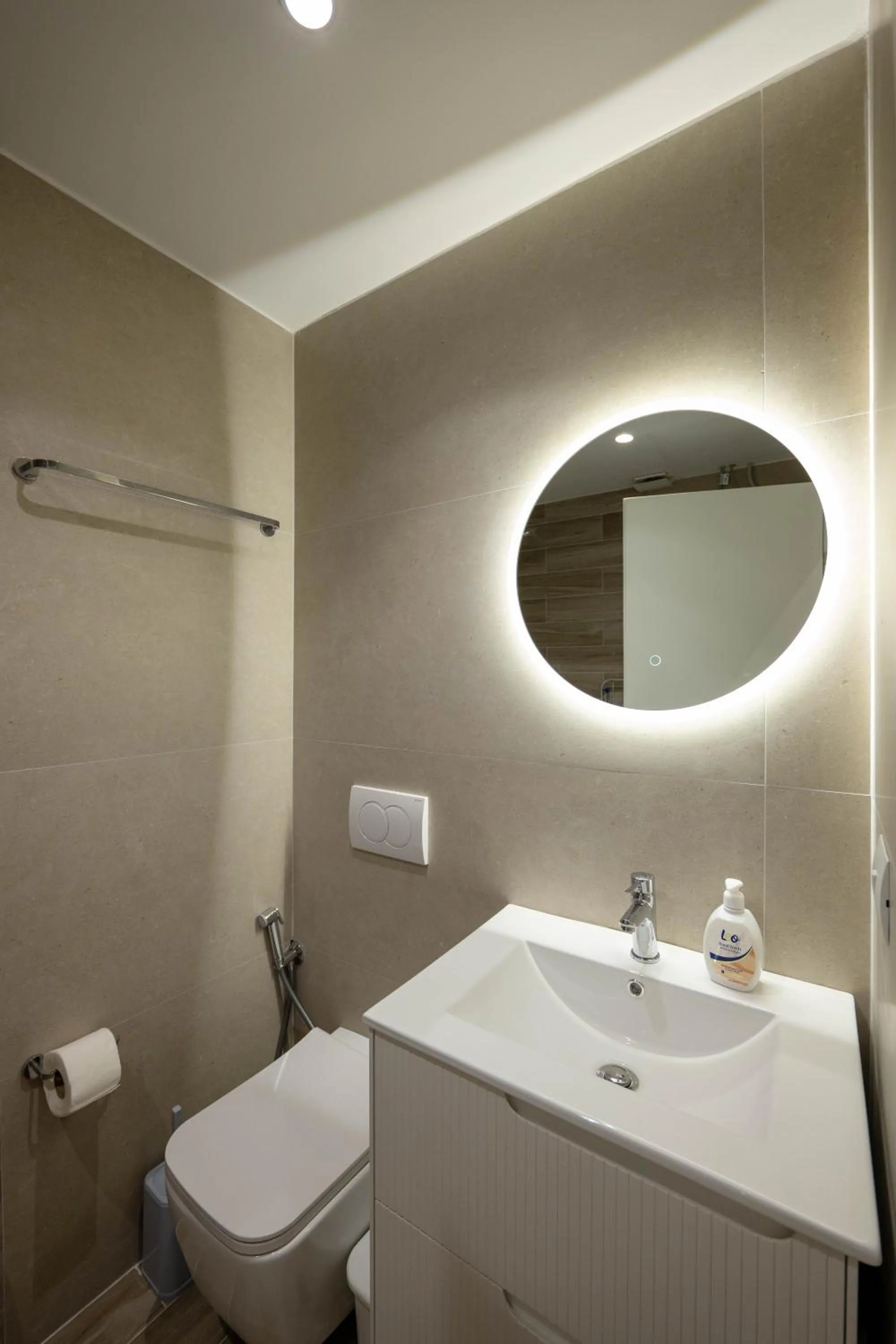 Toilet in Regal Luxury Apartments