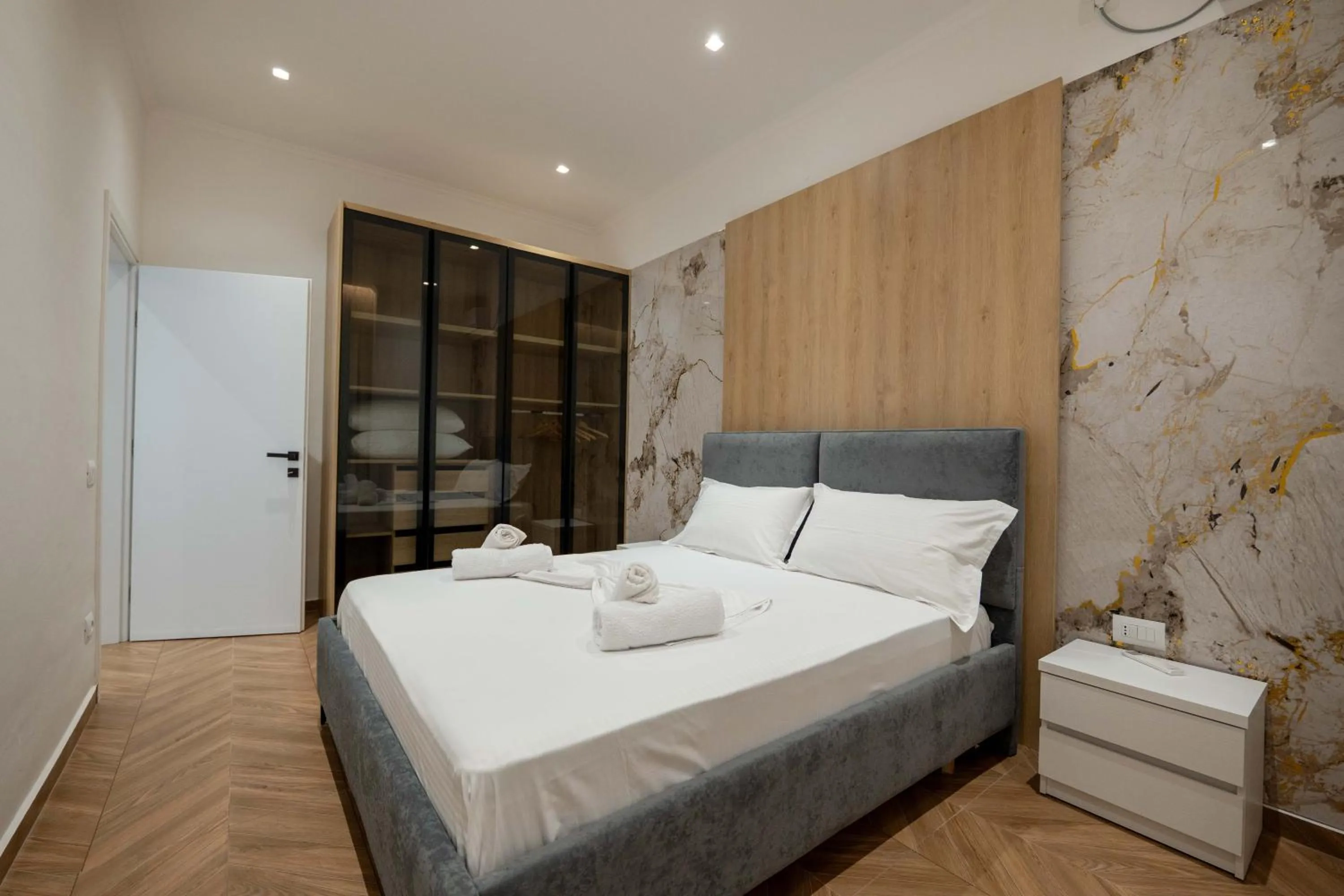 Bed in Regal Luxury Apartments