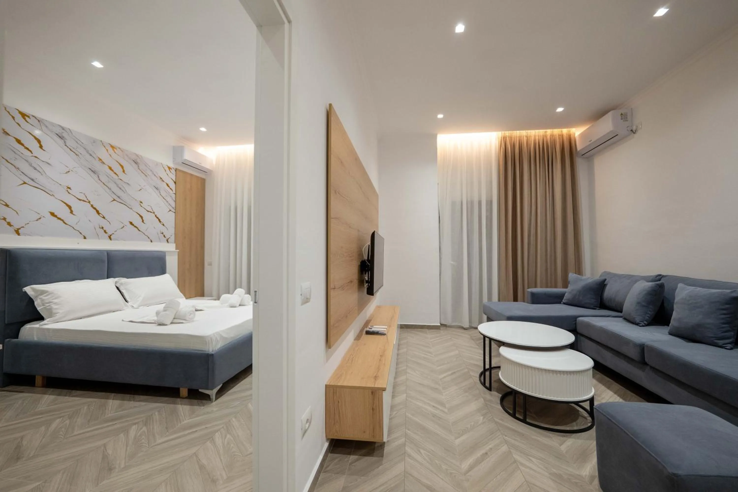 Bed in Regal Luxury Apartments