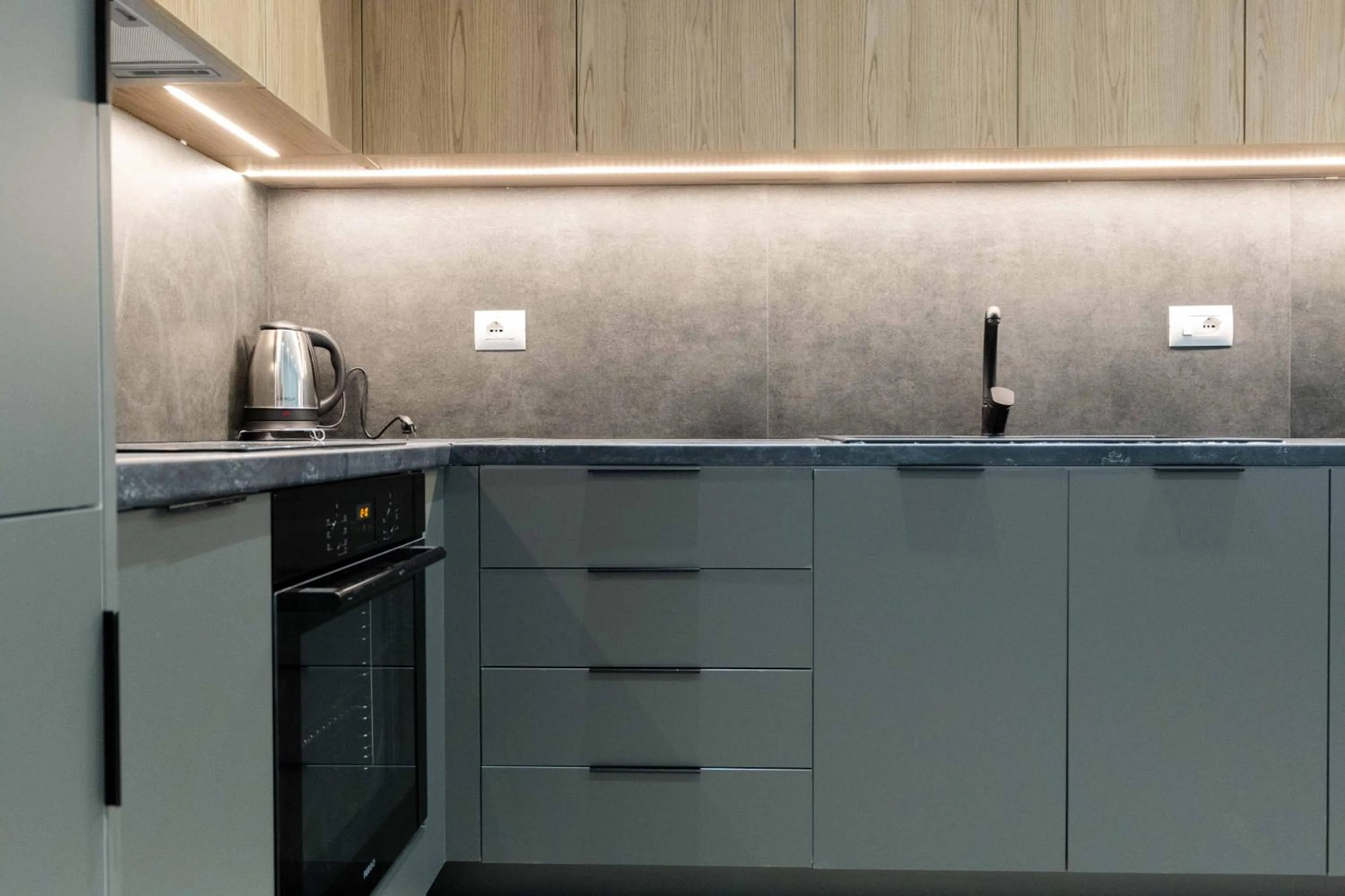 Kitchen or kitchenette in Regal Luxury Apartments