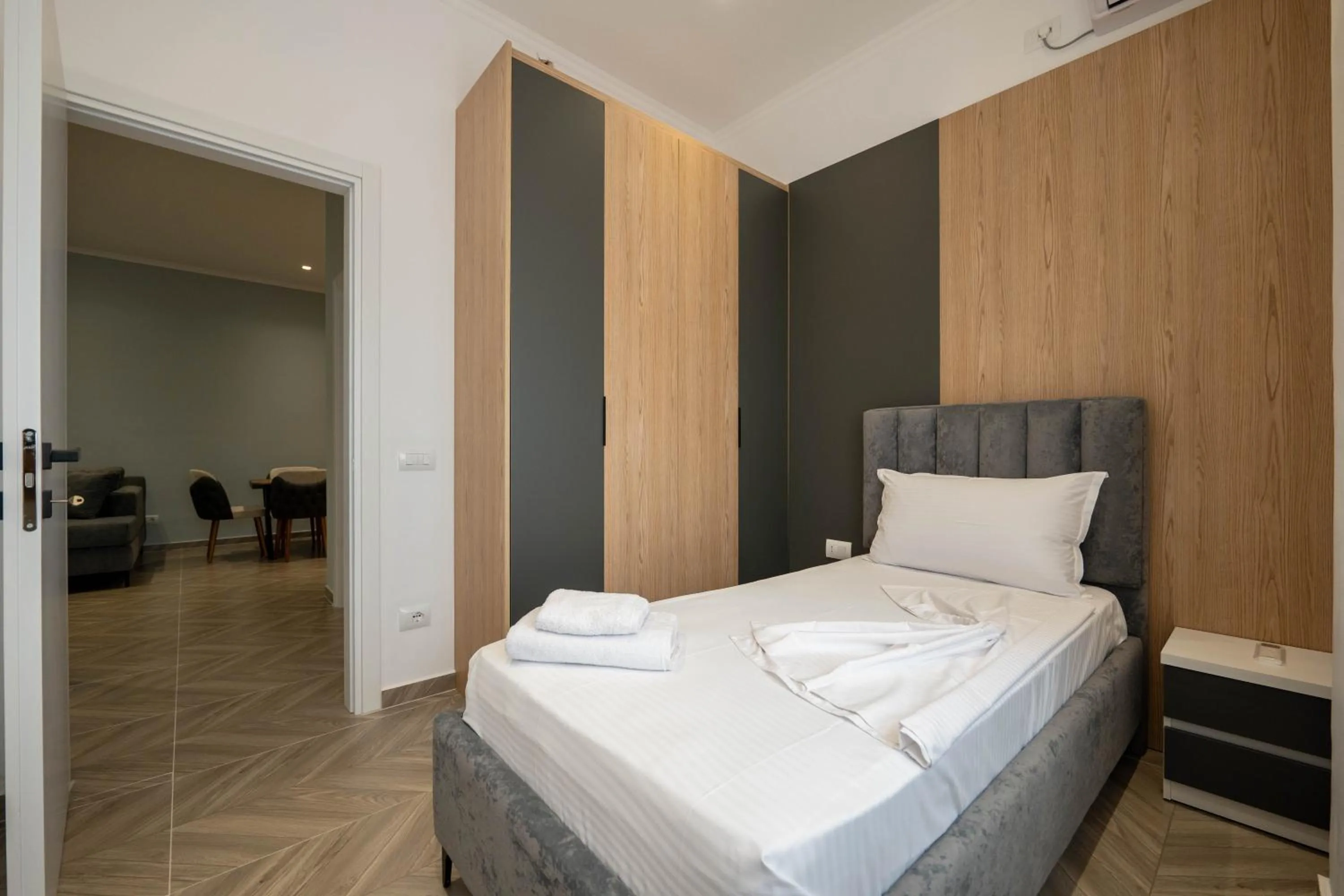 Bed in Regal Luxury Apartments