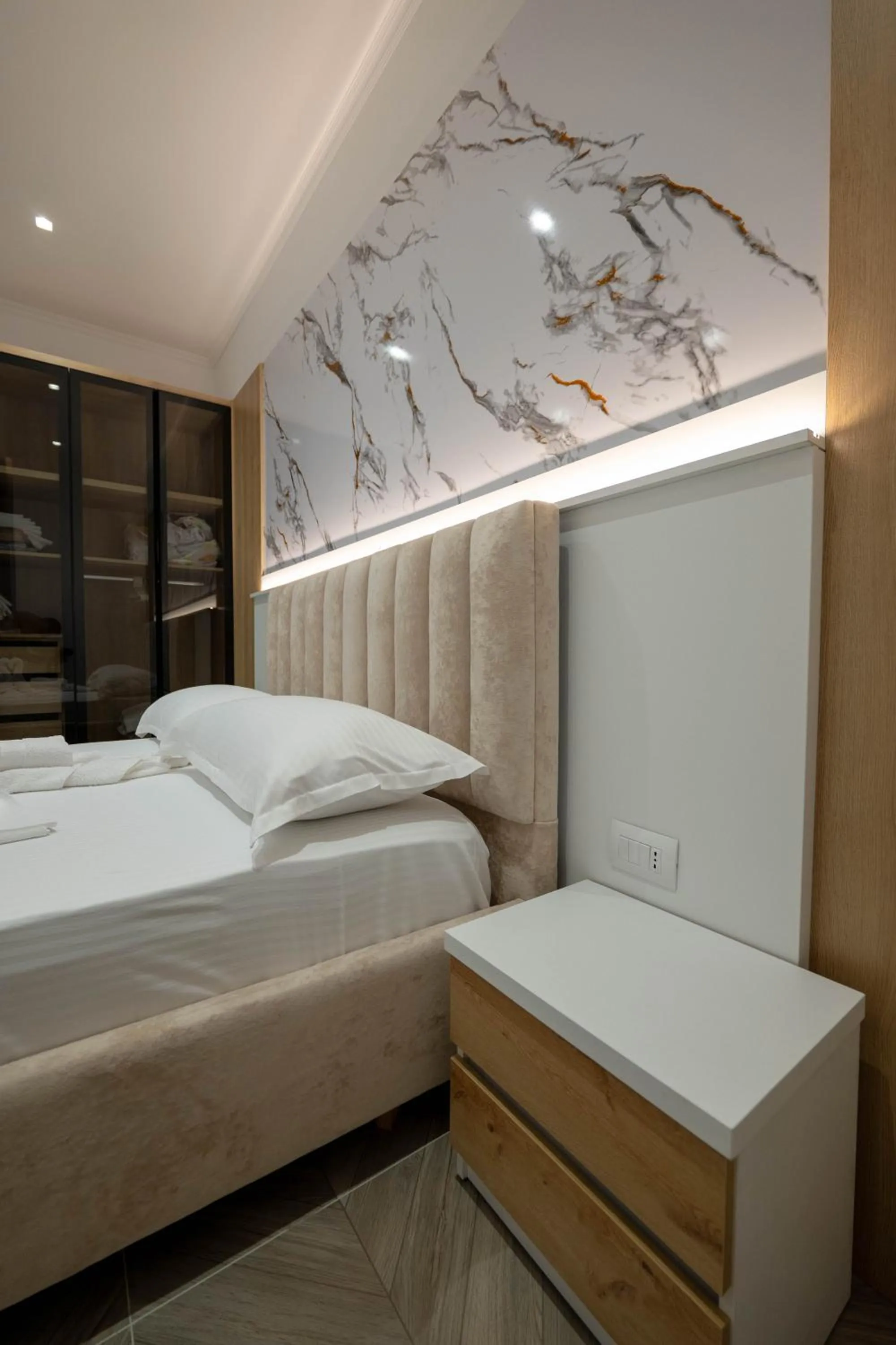 Bed in Regal Luxury Apartments