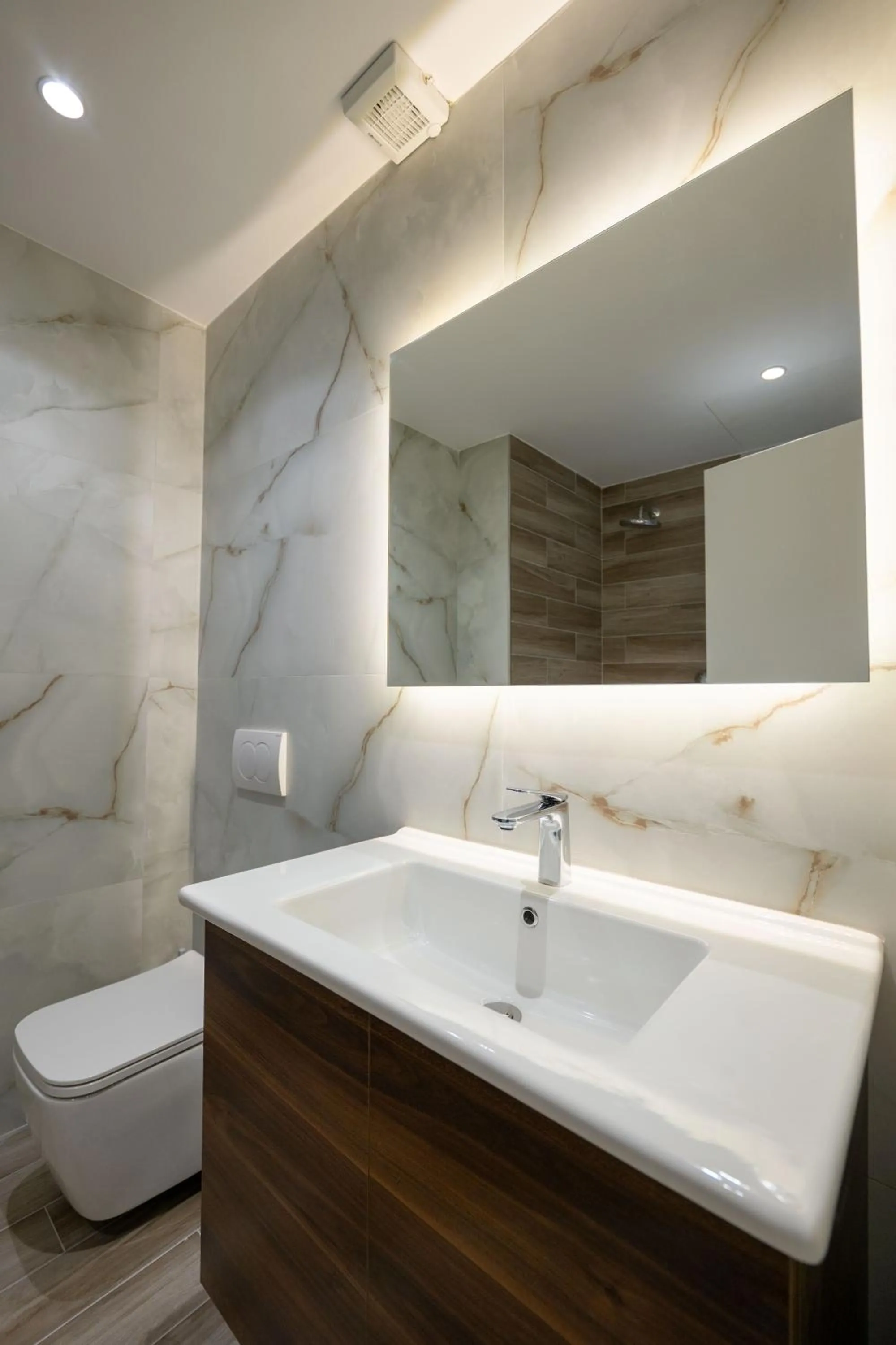 Toilet in Regal Luxury Apartments