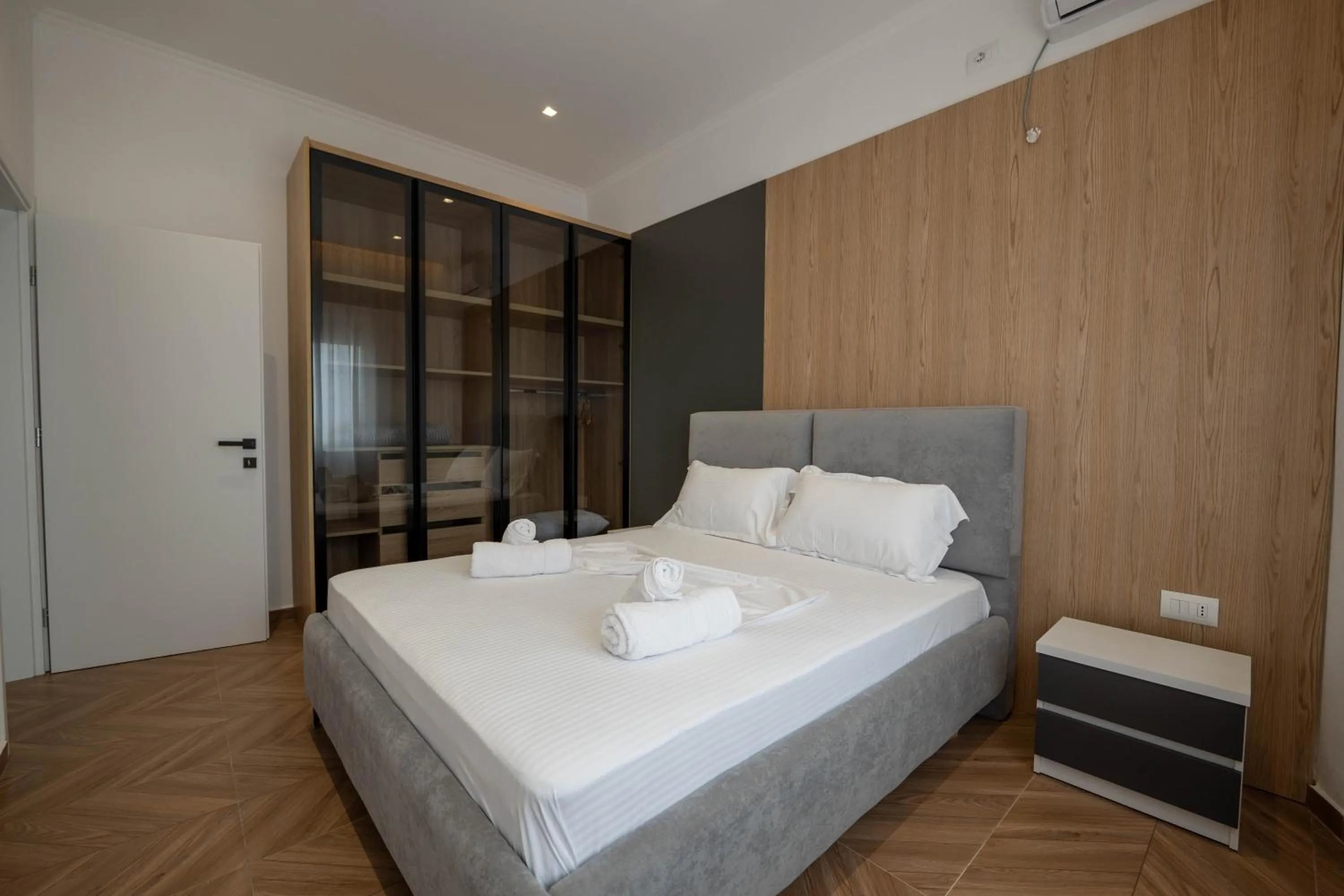 Bed in Regal Luxury Apartments