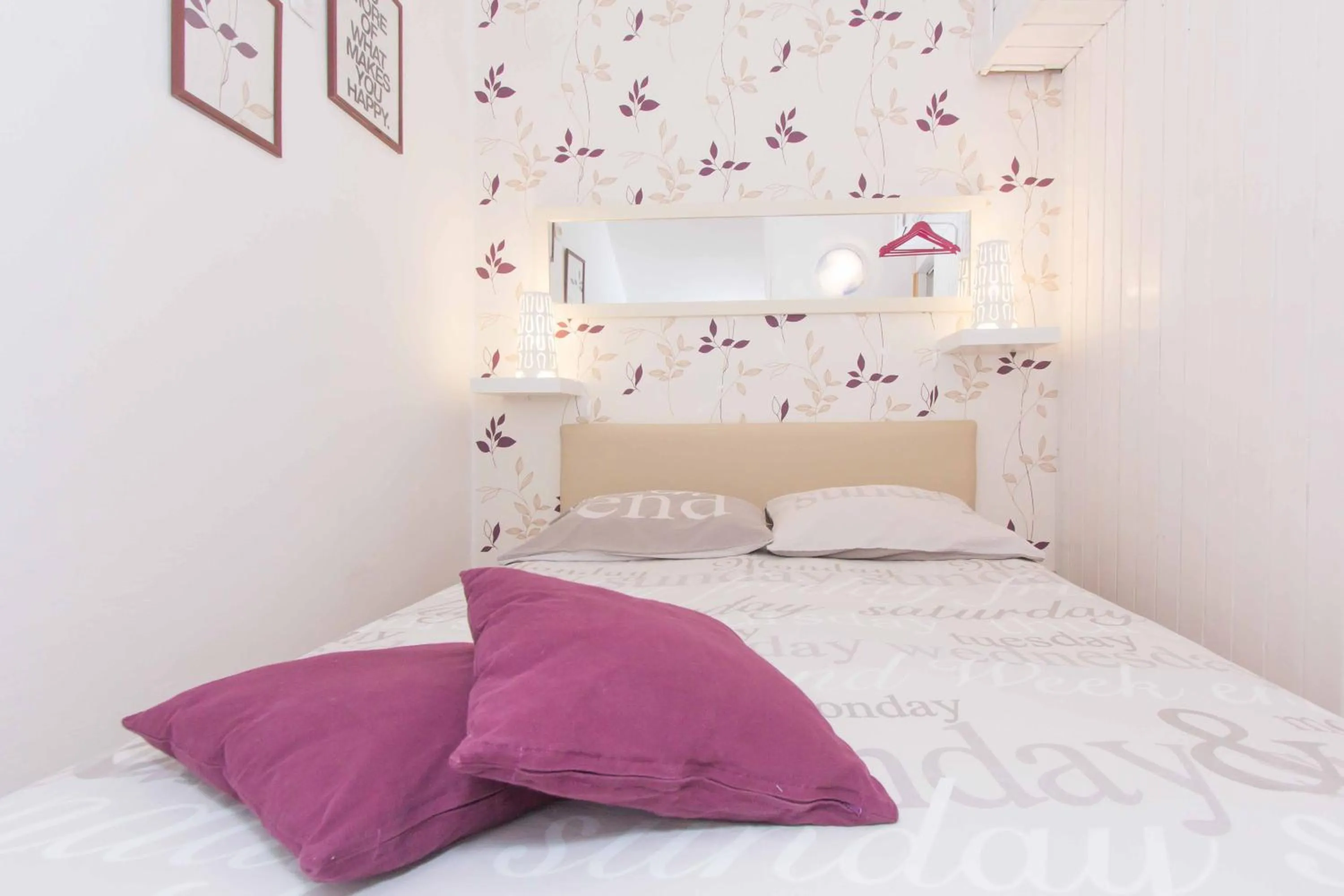 Bed in Red Valentino Apartment