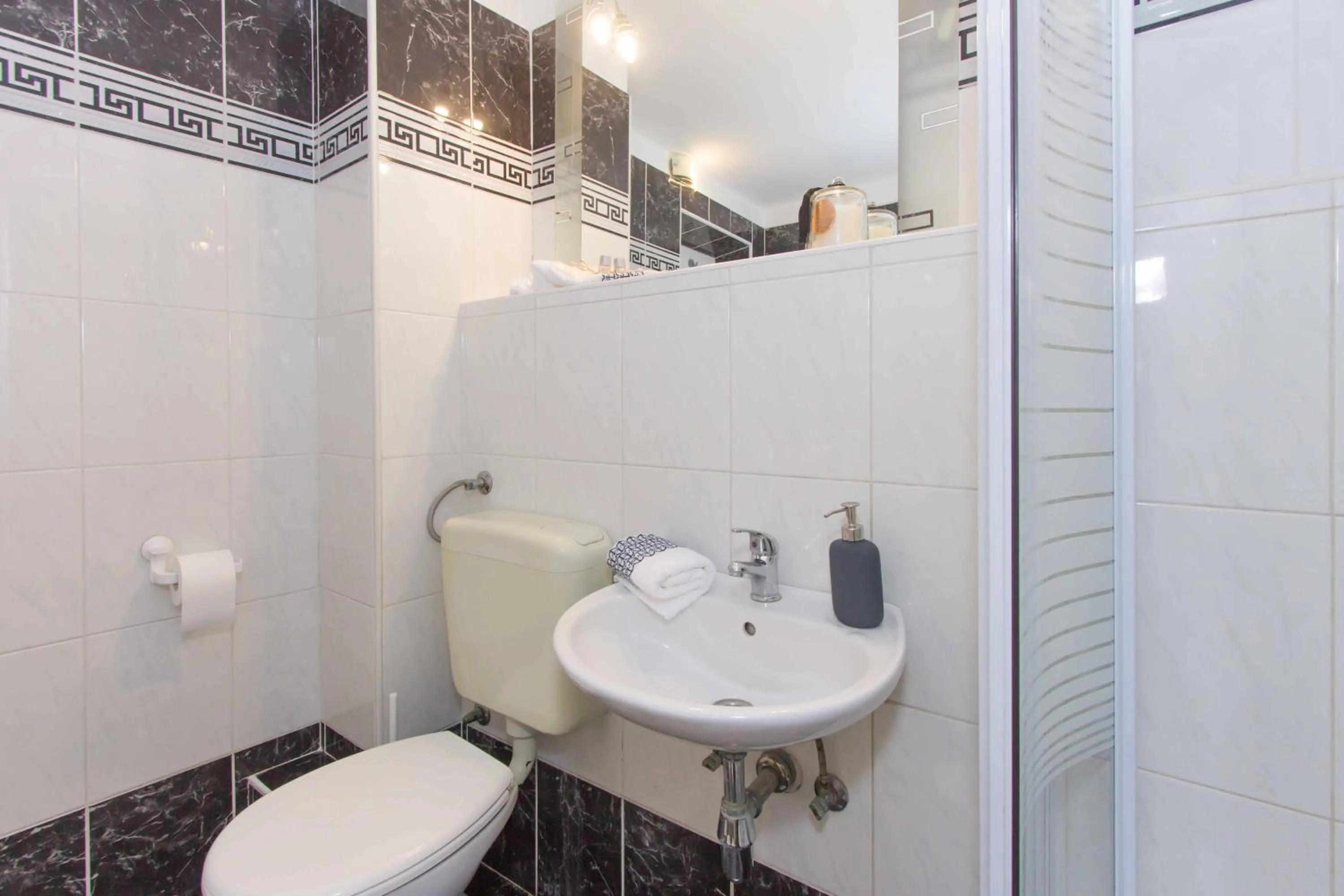 Shower in Red Valentino Apartment