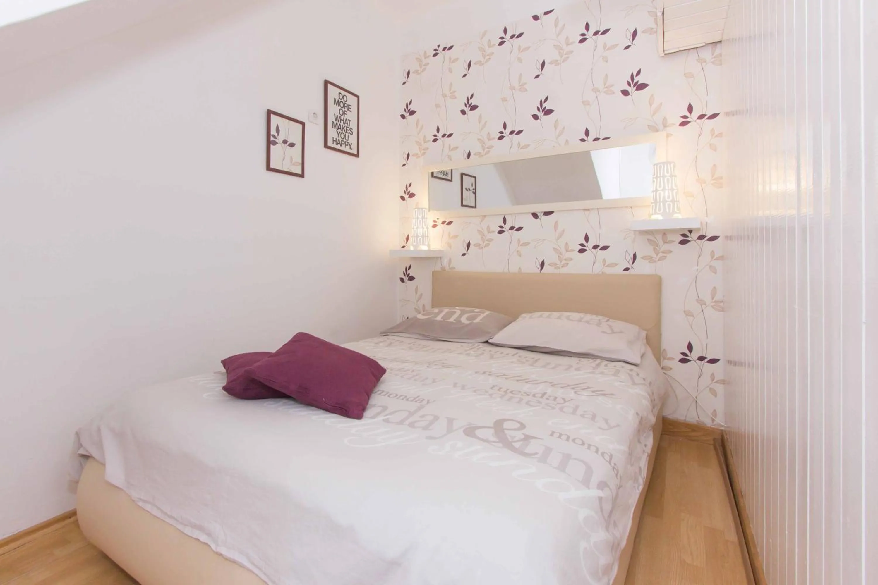Bed in Red Valentino Apartment