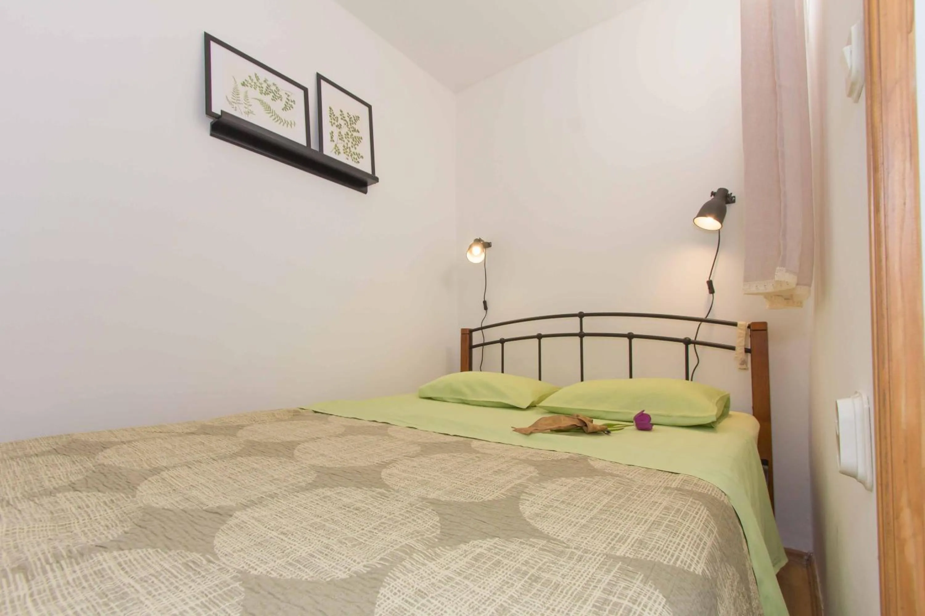 Decorative detail, Bed in Red Valentino Apartment