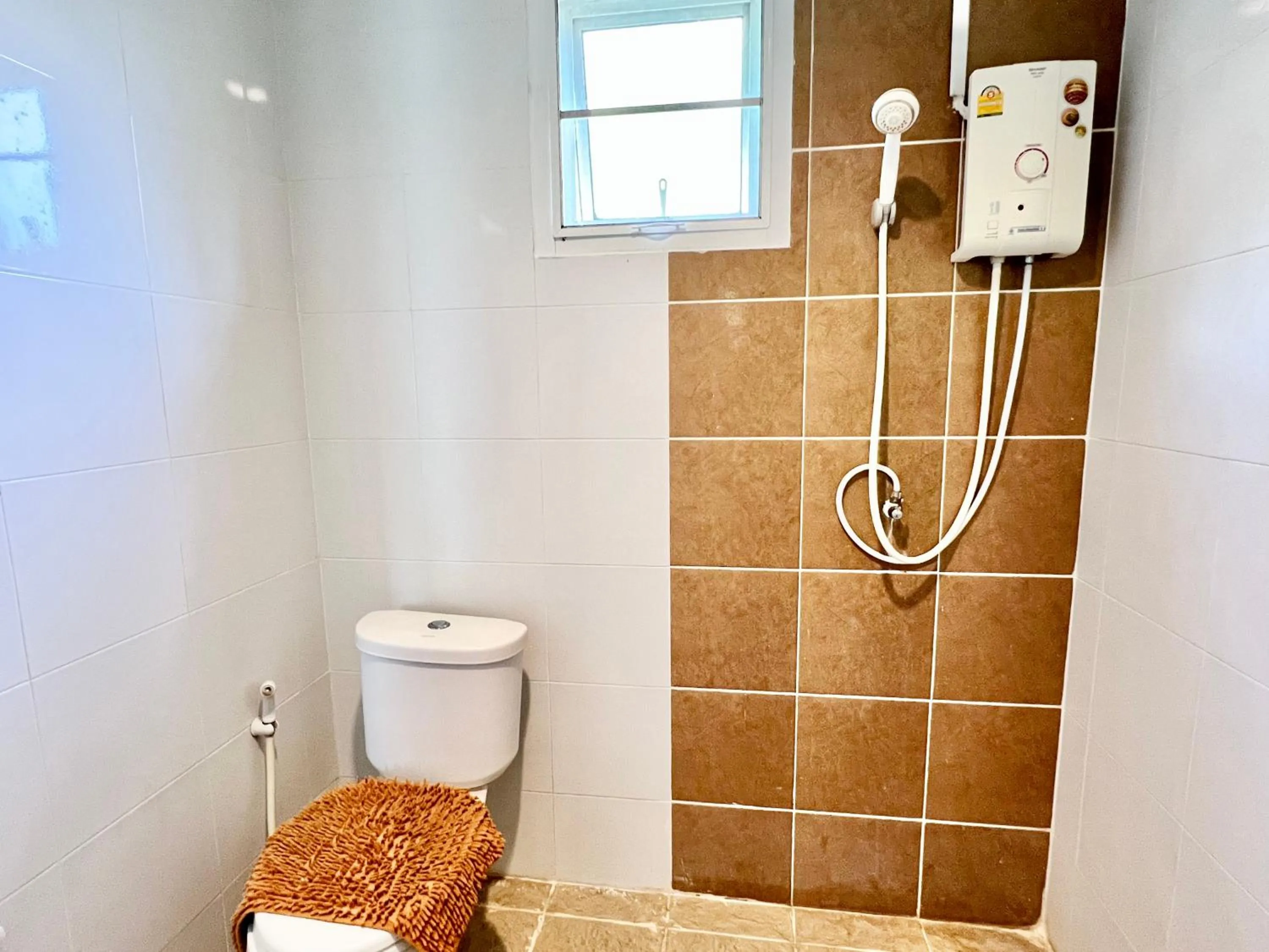 Bathroom in Rungreang Hotel