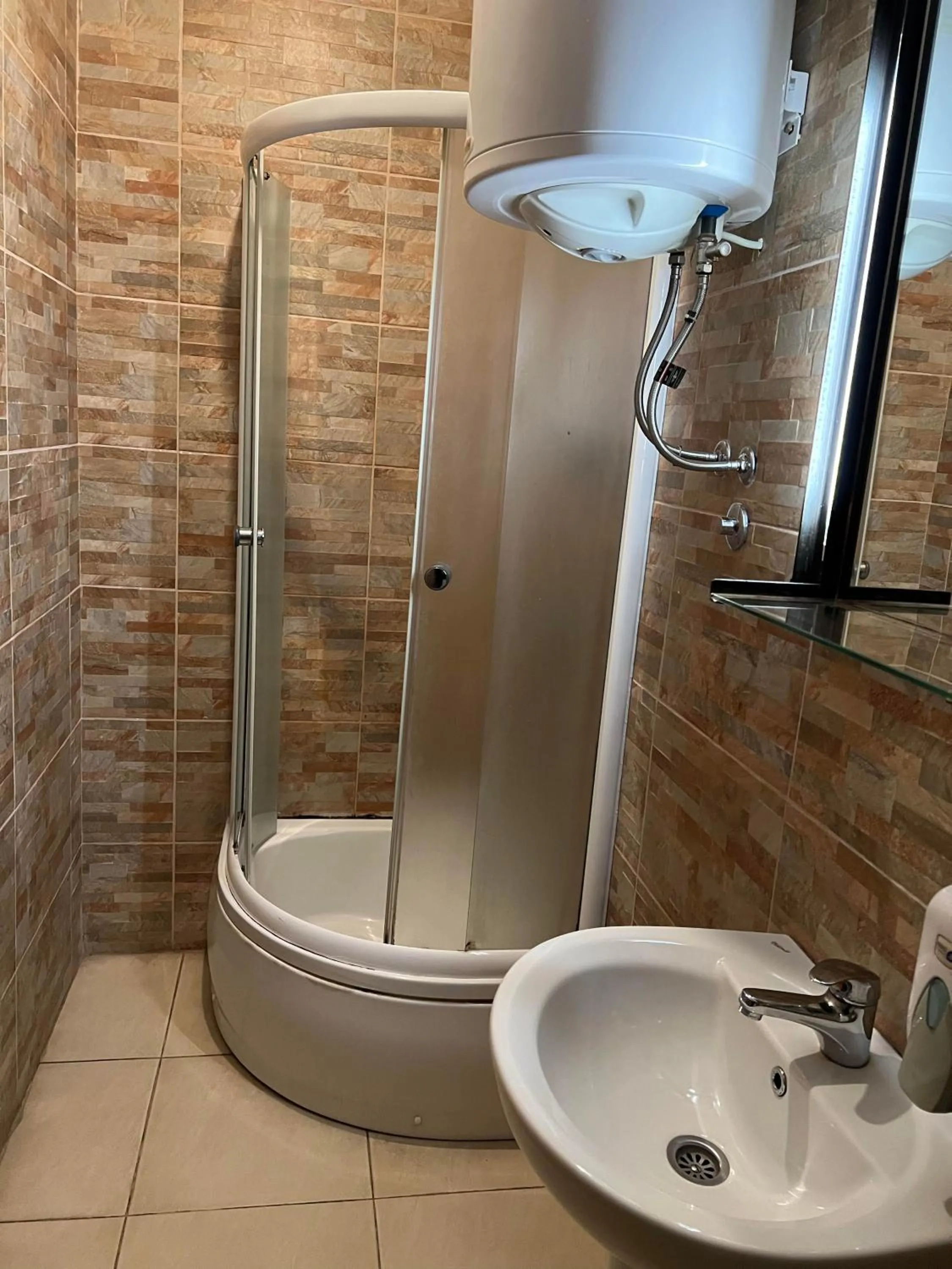 Shower in Hostel Fair and Square