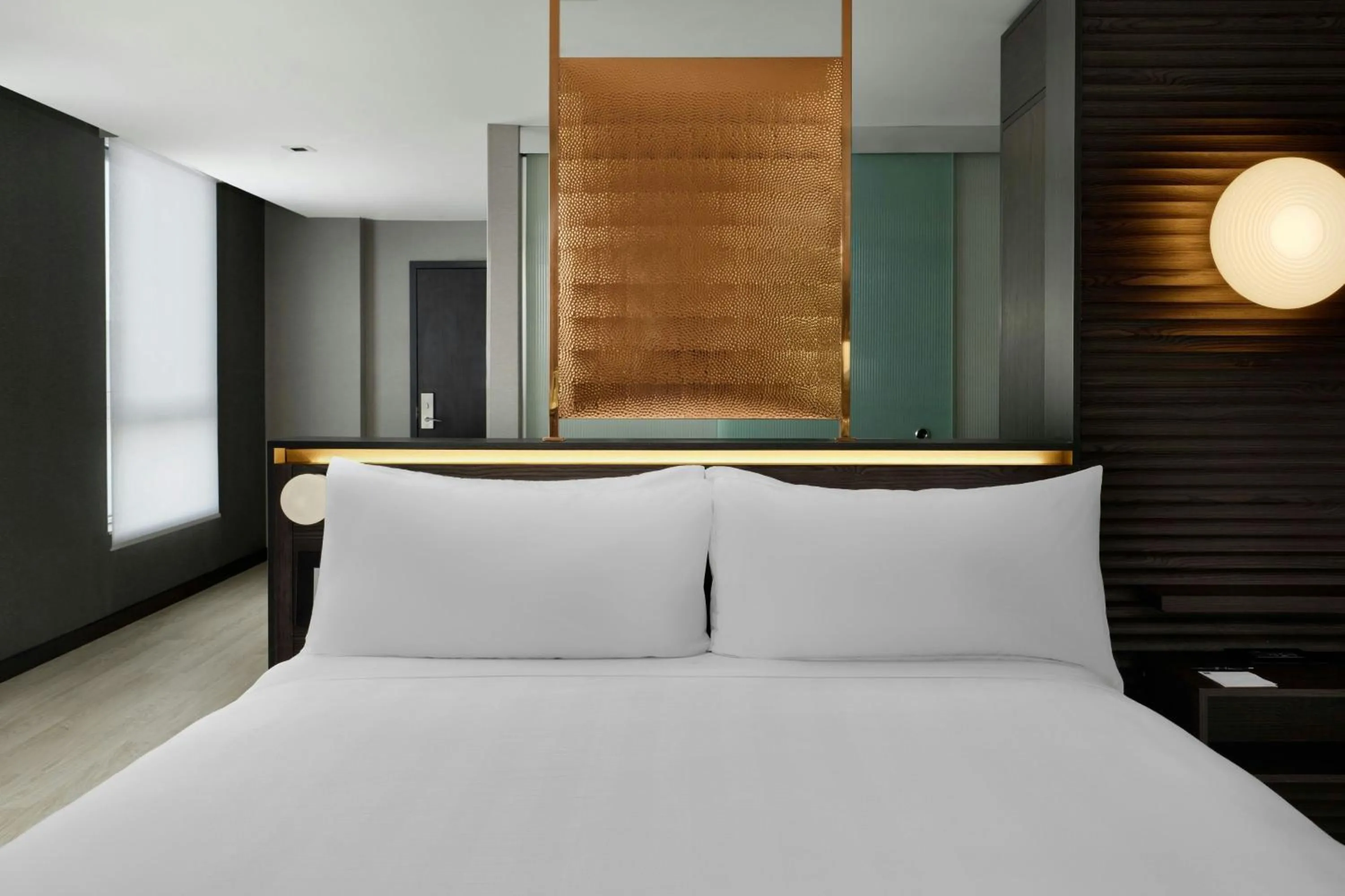 Photo of the whole room, Bed in AC Hotel by Marriott Burlington