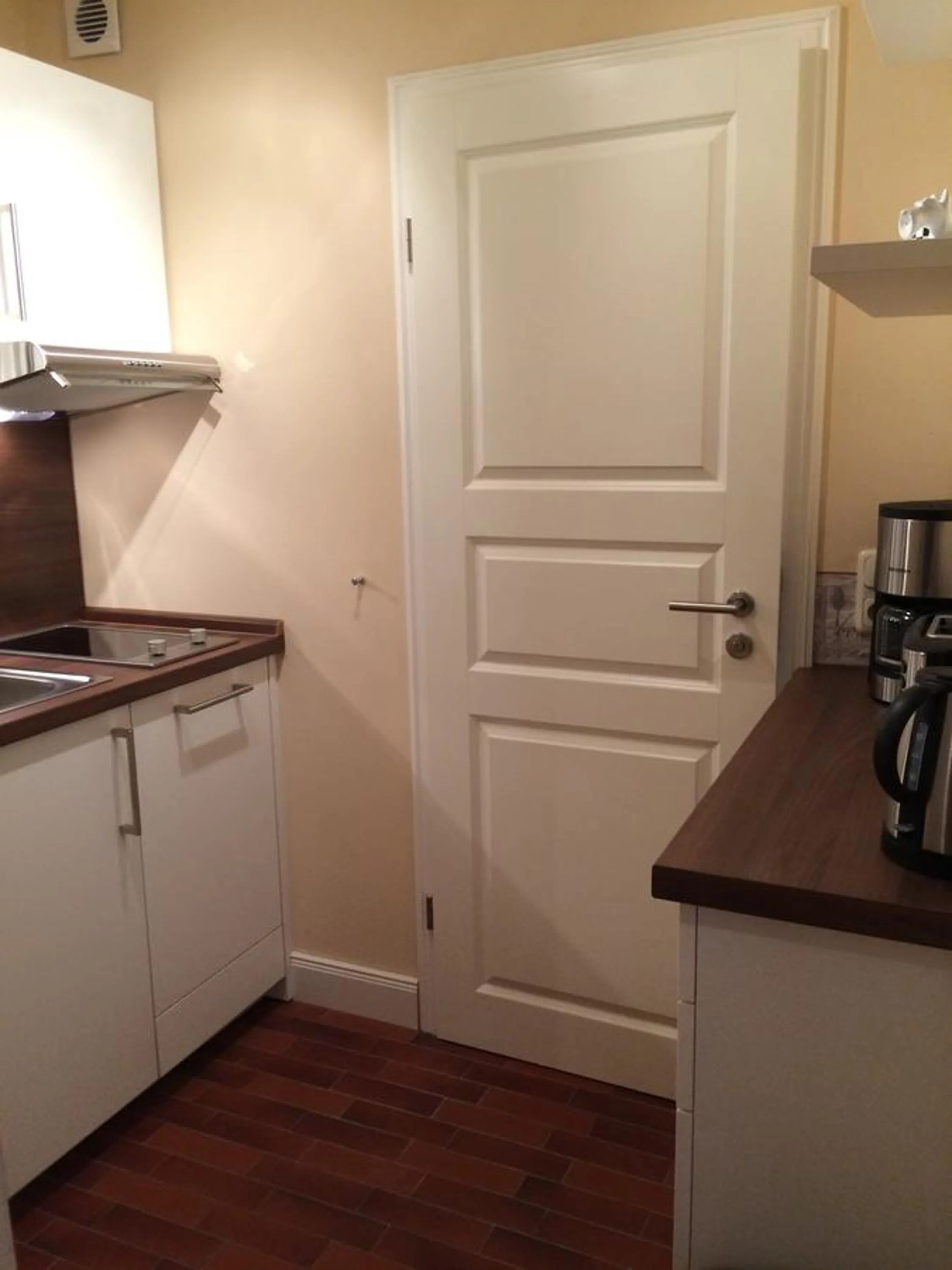 Kitchen or kitchenette in Ferienwohnung Strandgut