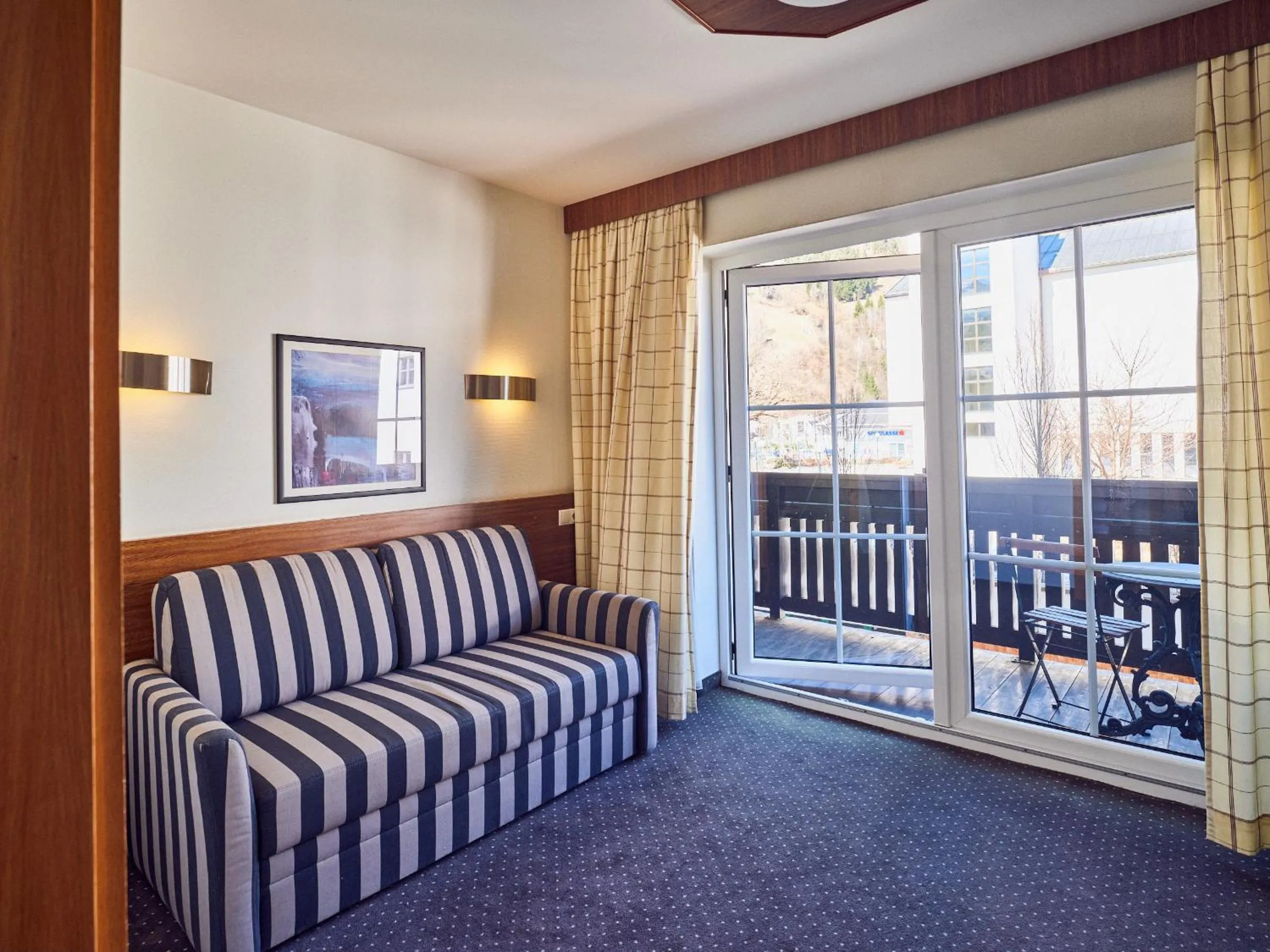 Bed in Hotel Pinzgauerhof by Alpeffect Hotels