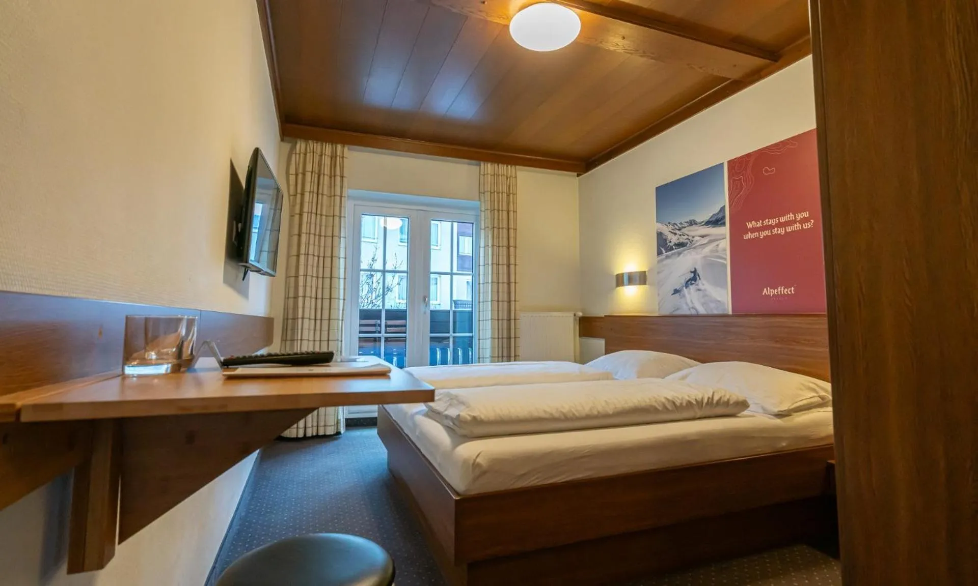 Bedroom, Bed in Hotel Pinzgauerhof by Alpeffect Hotels