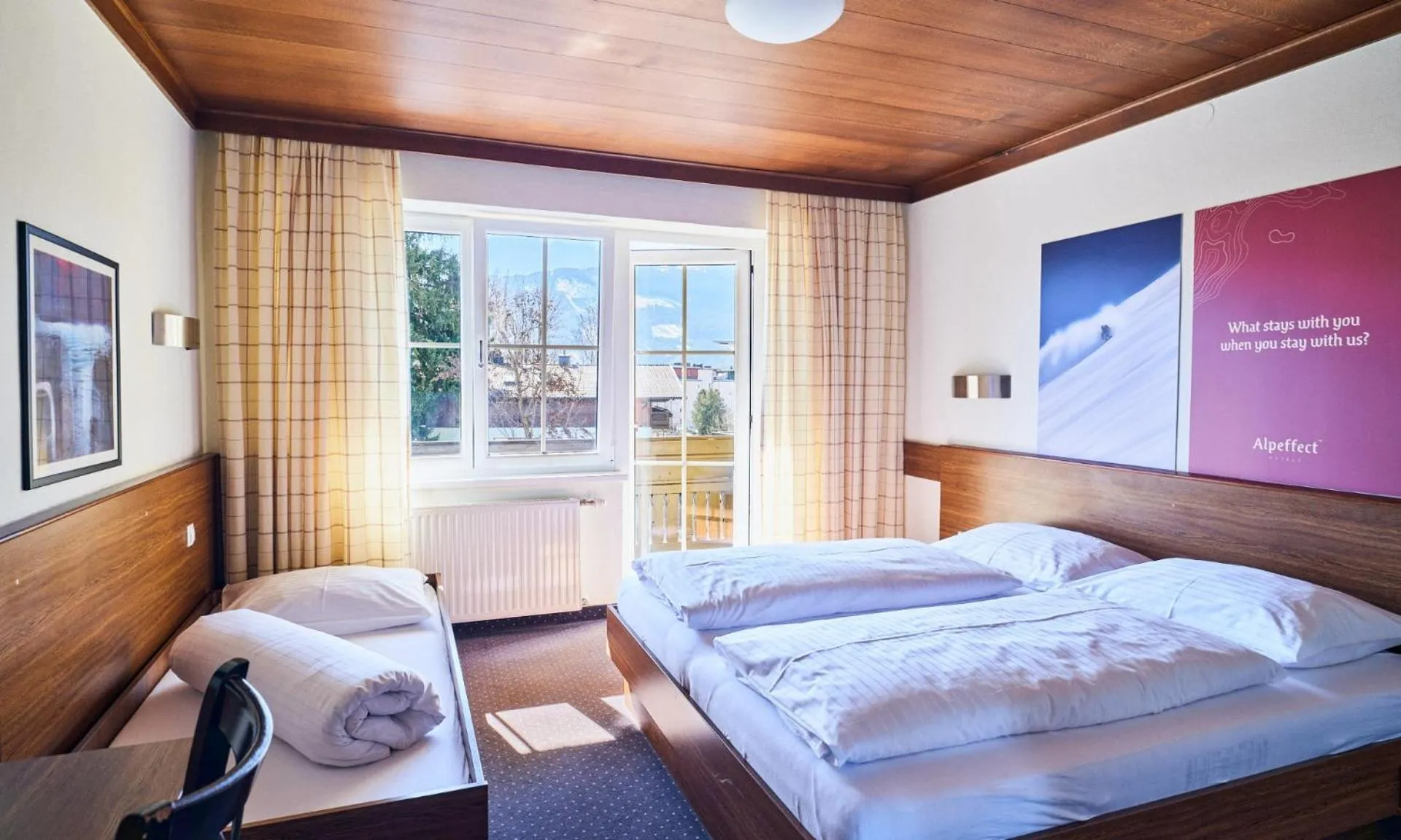 Bed in Hotel Pinzgauerhof by Alpeffect Hotels