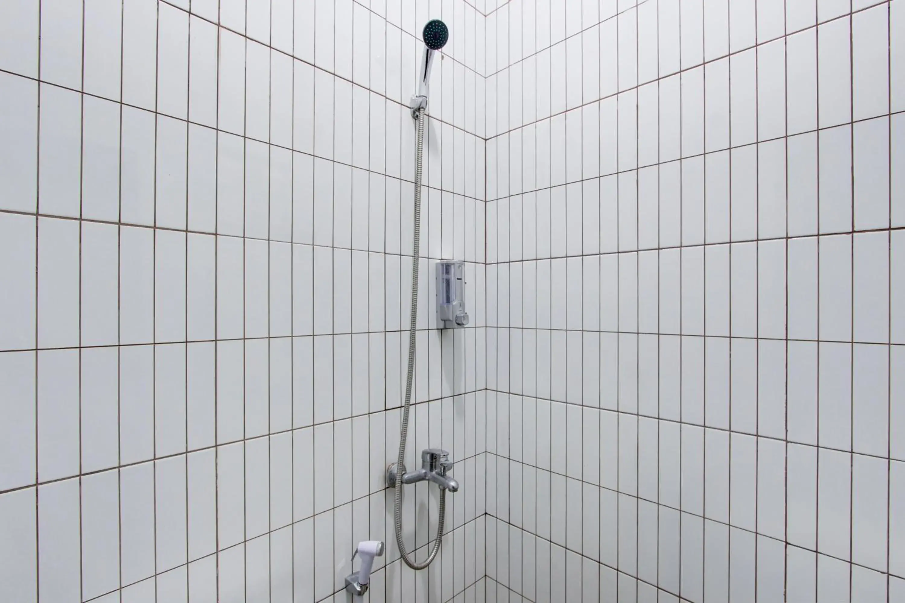 Bathroom in Hotel O Yogyakarta near Jalan Malioboro formerly Malio Inn Bathroom in Hotel O Yogyakarta near Jalan Malioboro formerly Malio Inn