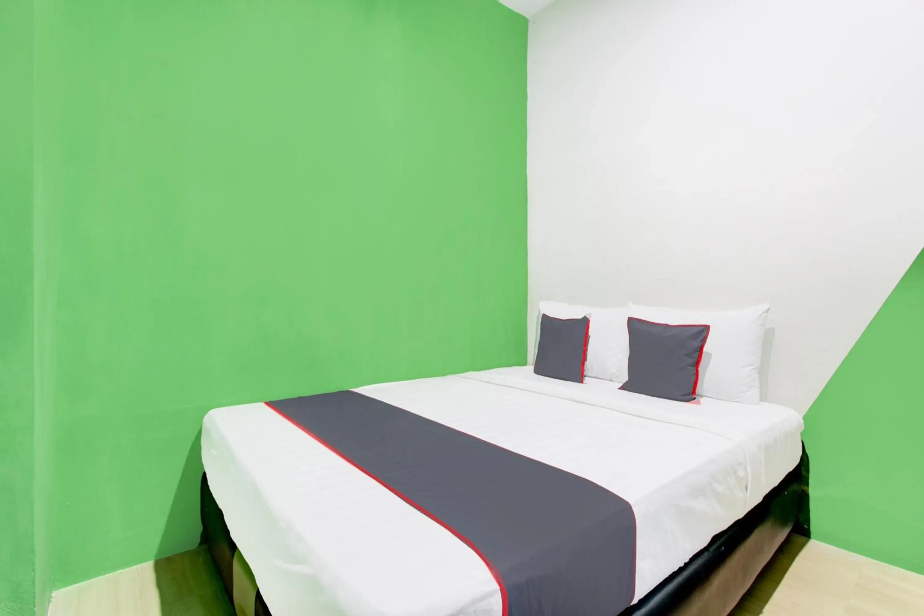 Bedroom, Bed in Hotel O Yogyakarta near Jalan Malioboro formerly Malio Inn Bedroom, Bed in Hotel O Yogyakarta near Jalan Malioboro formerly Malio Inn