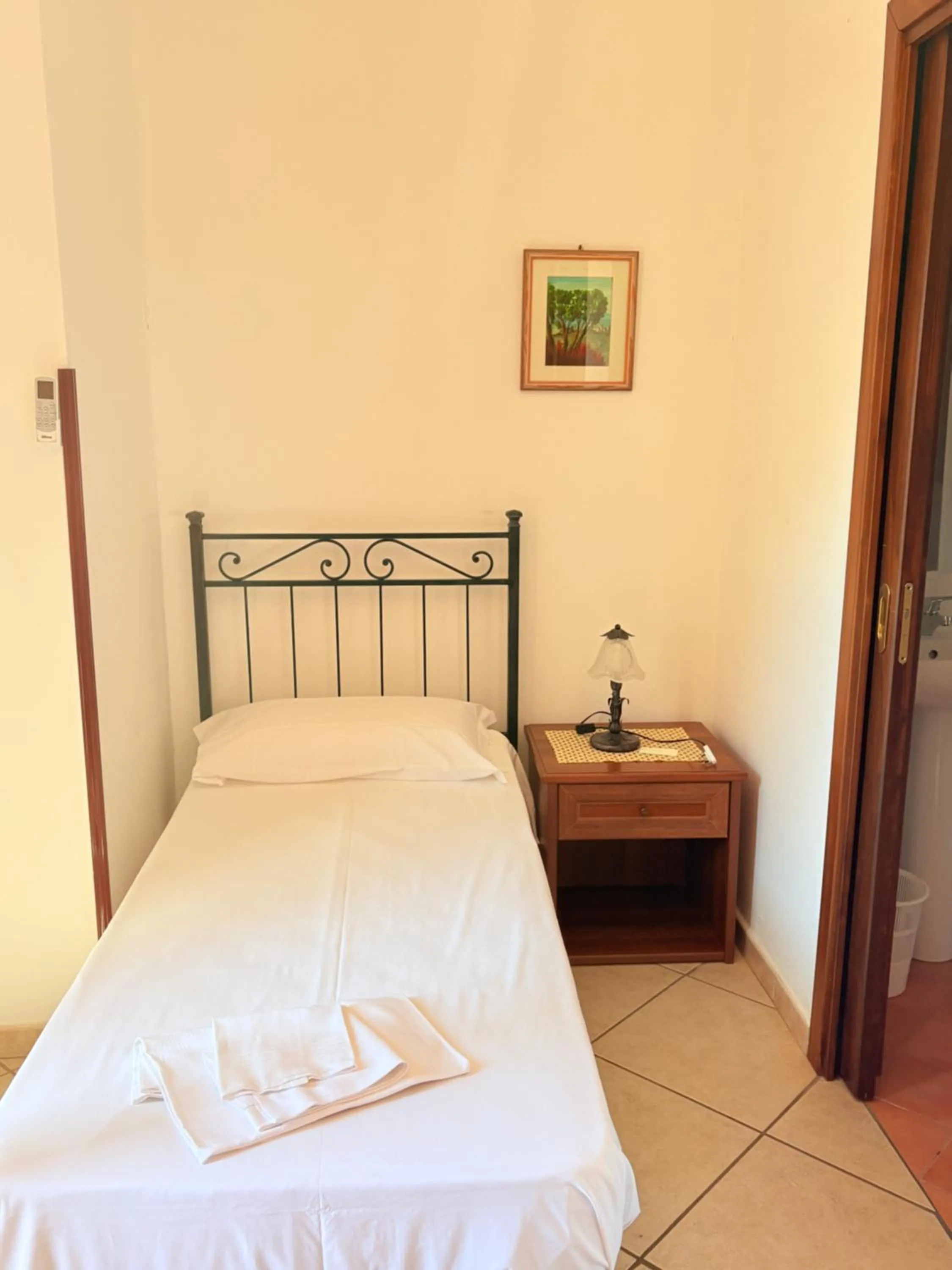 Bed in Hotel Savoia