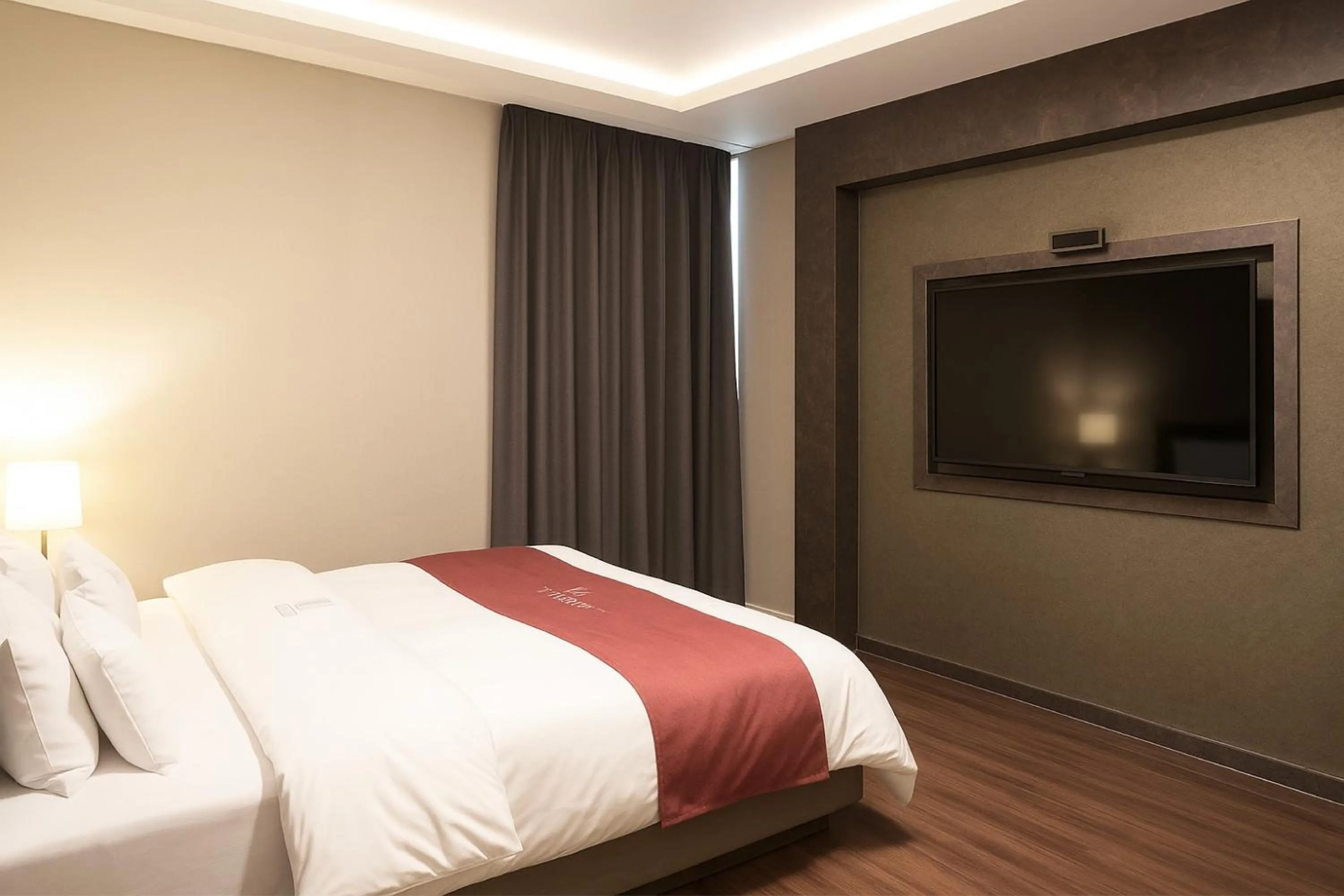 Bed in Seosan Modern Hotel