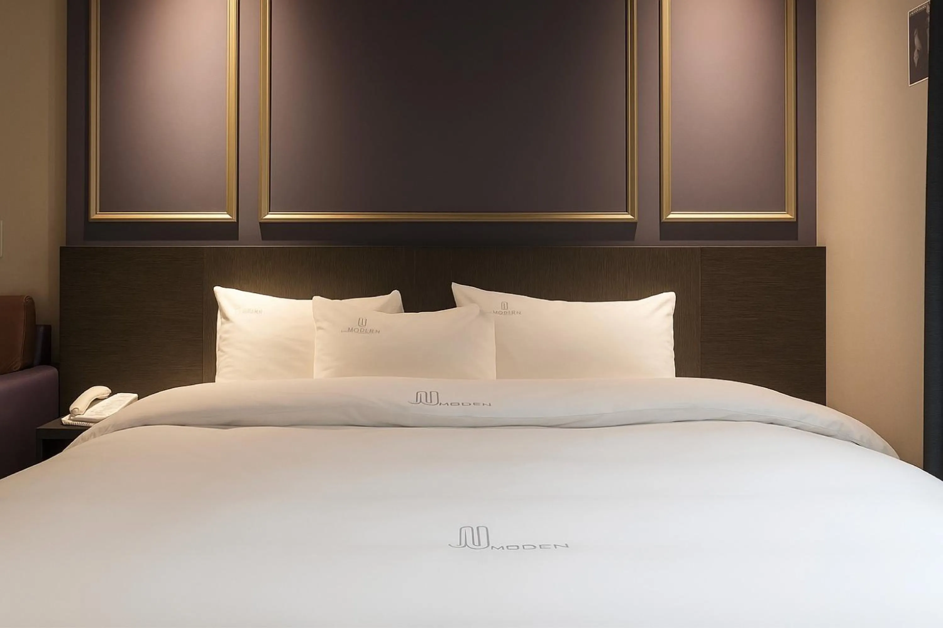 Bed in Seosan Modern Hotel